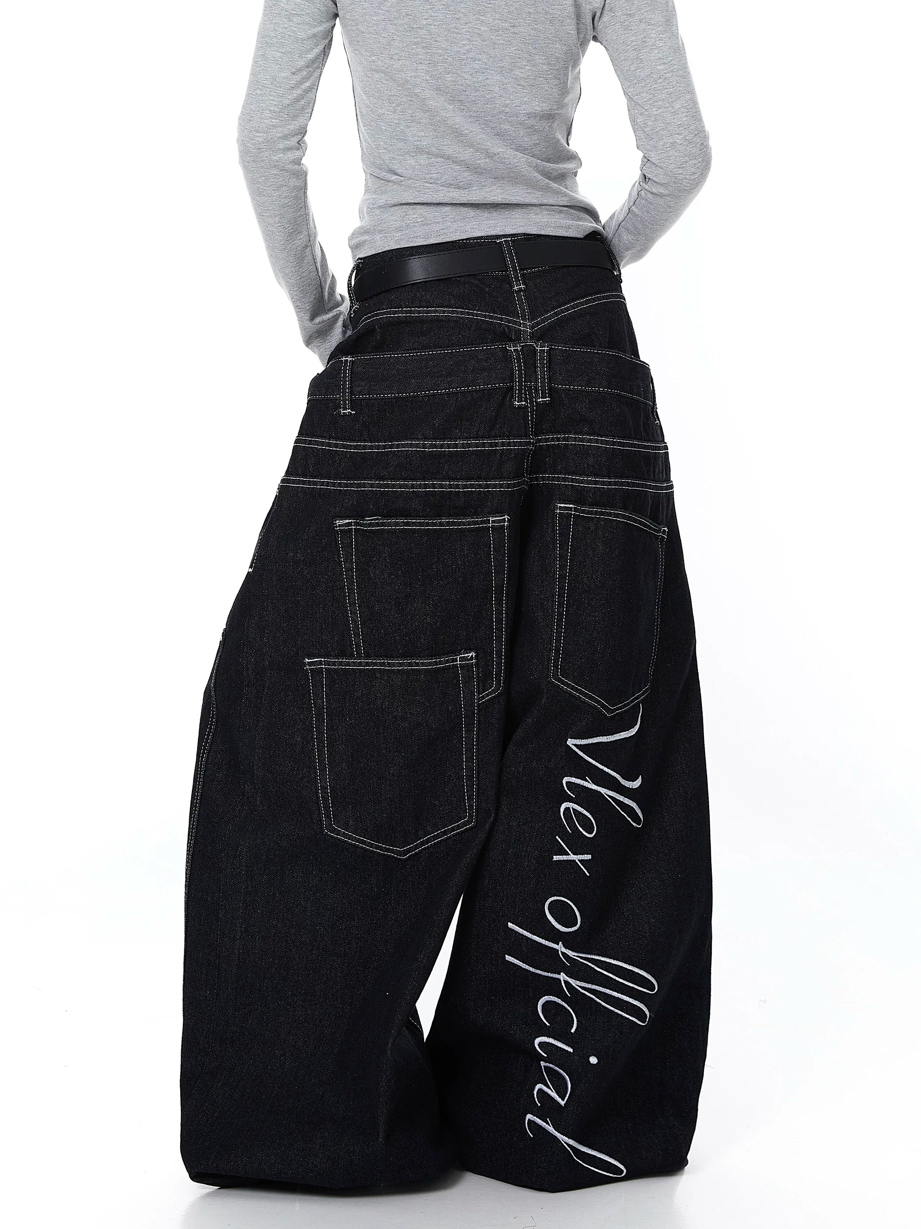Sanhoostudio denim pants featuring double waistband design, exposed stitching, and button details. Built with a wide leg silhouette for high street styling.