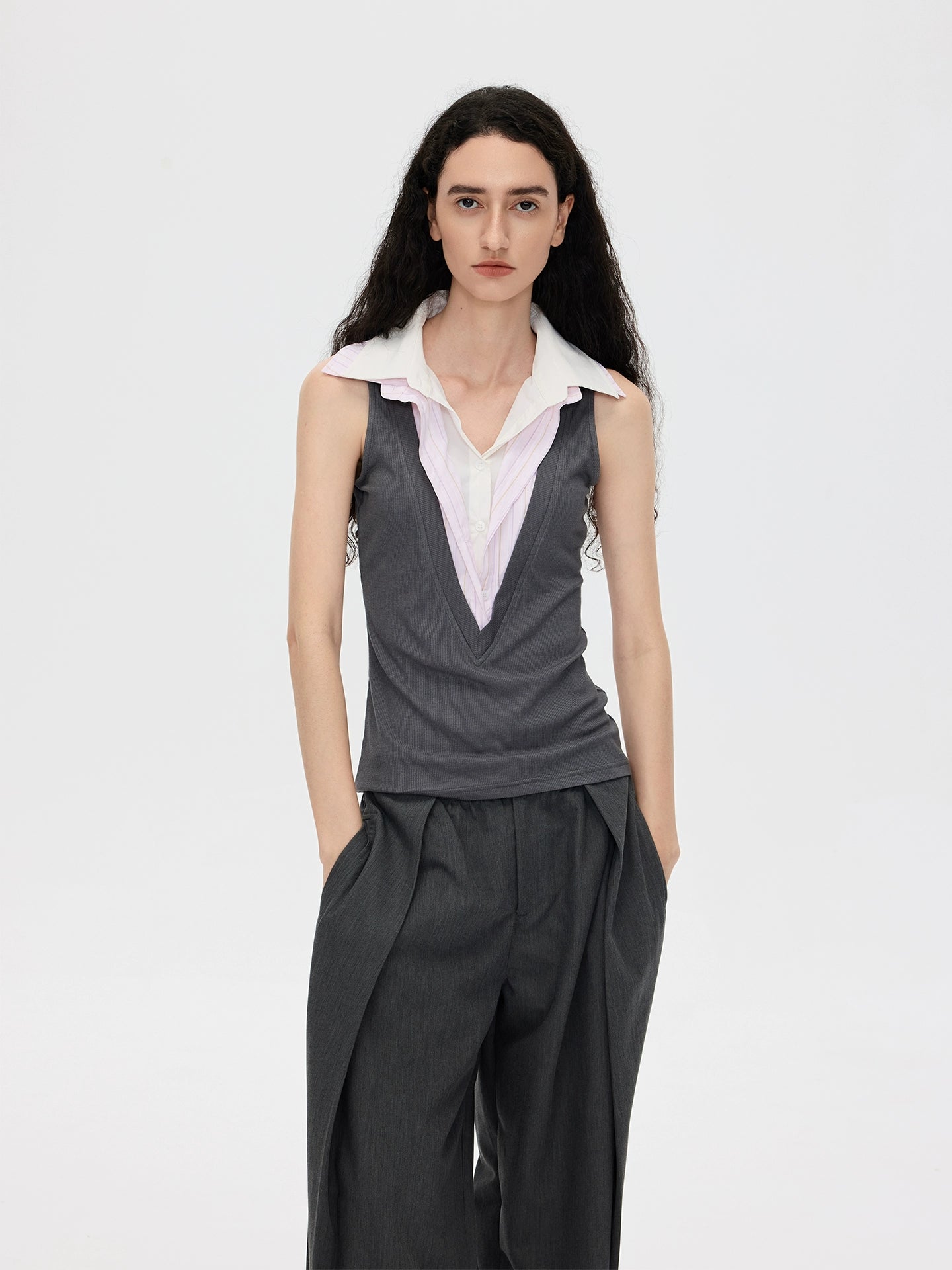 This stylish pink striped knit tank top from Sanhoostudio features a unique double-layer neckline with acetate fabric, offering a slim fit and modern streetwear vibe. Perfect for layering or standalone wear in both casual and chic outfits.