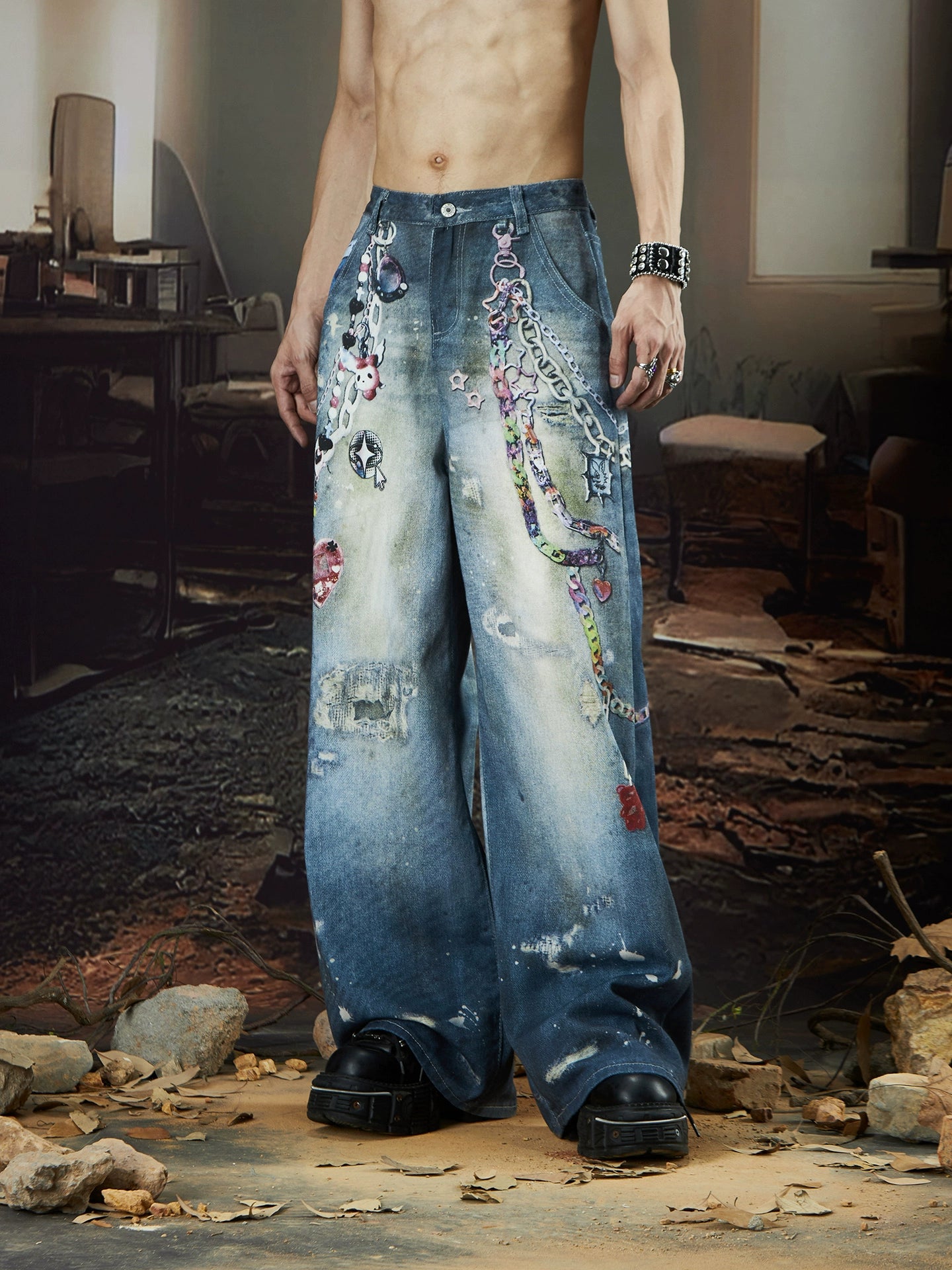 The Sanhoostudio jeans combine digital multicolor chain prints with a washed distressed finish in a straight-leg silhouette. Their oversized cut and bold pattern make them an expressive statement piece for modern streetwear outfits.
