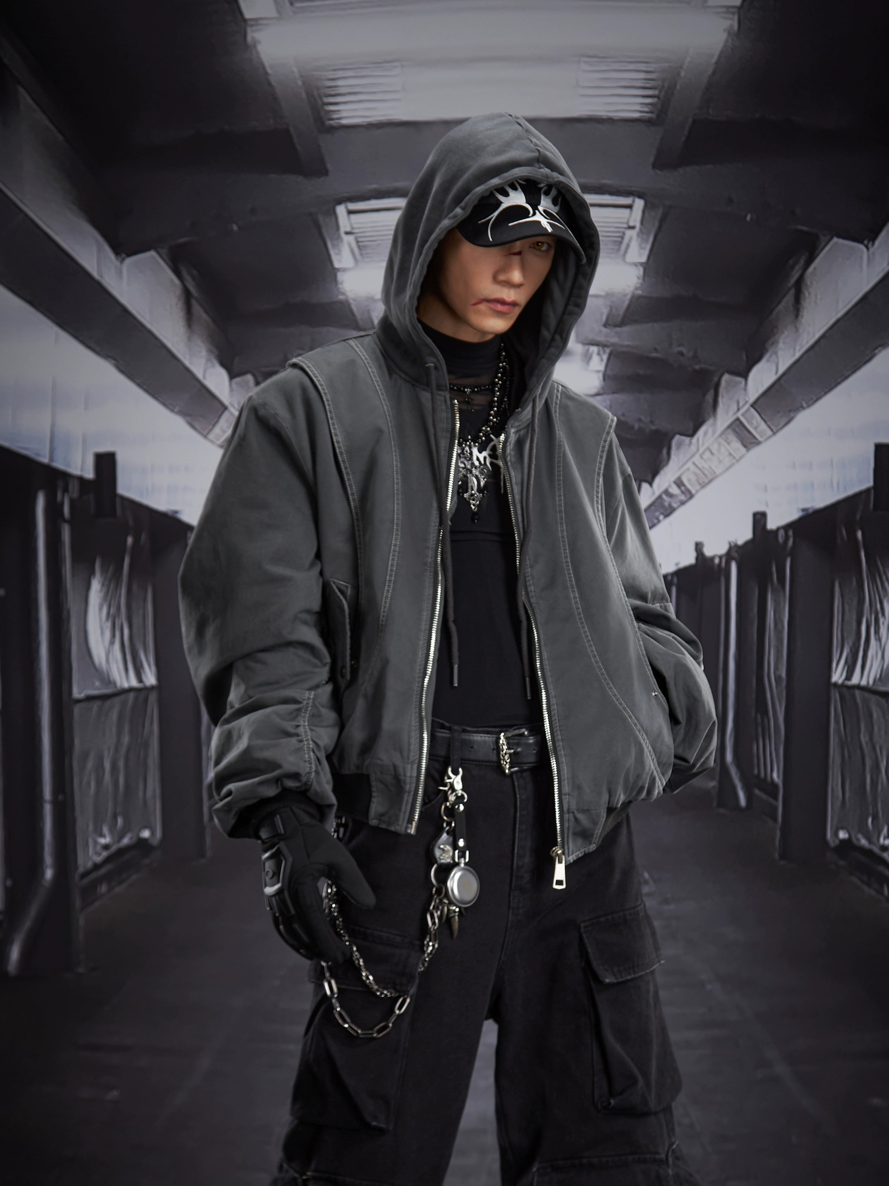 A versatile deconstructed utility puffer jacket with a hooded zip design, warm padding, and a relaxed cropped fit. Crafted by Sanhoostudio for a bold streetwear winter look.