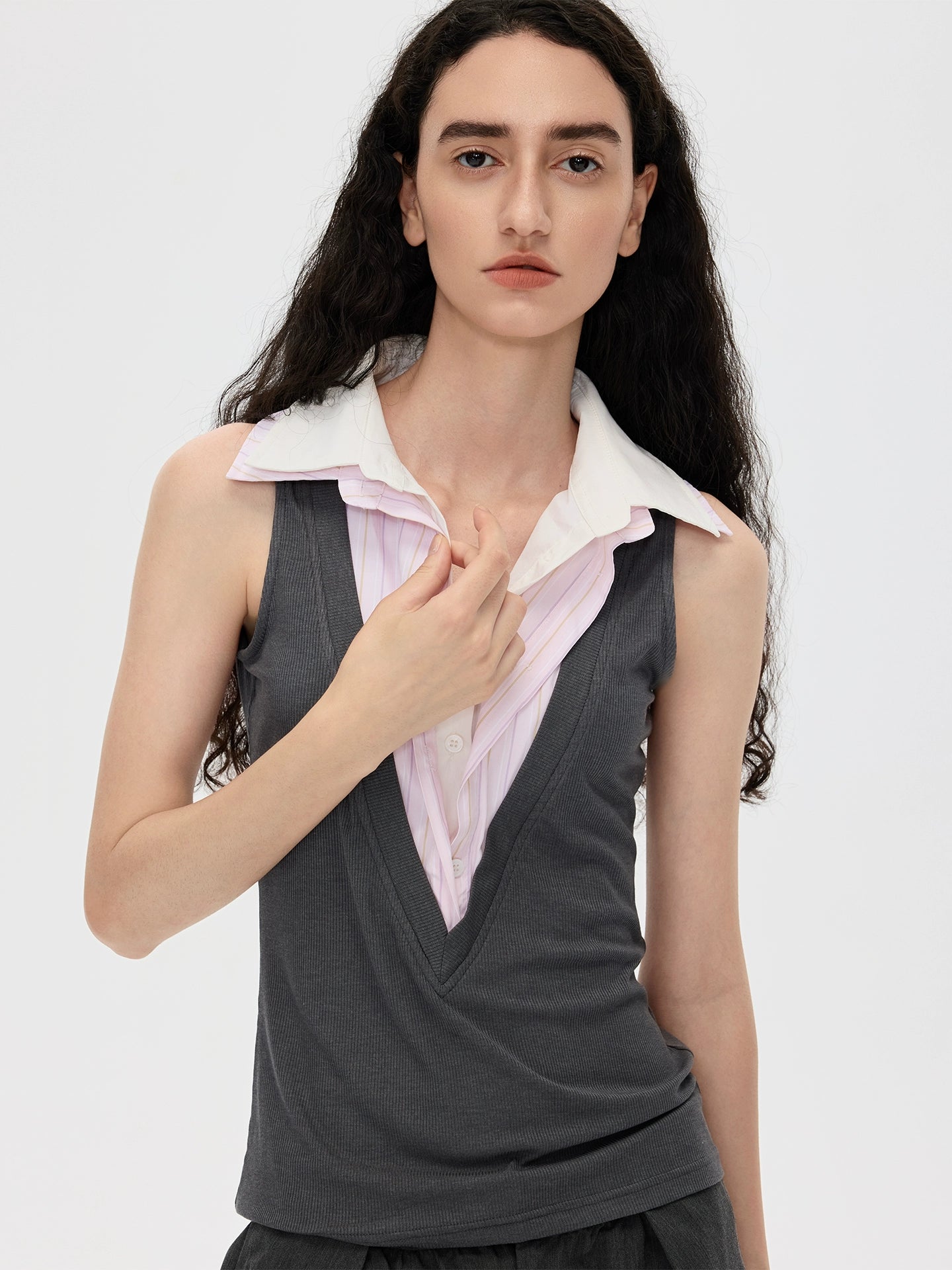 This stylish pink striped knit tank top from Sanhoostudio features a unique double-layer neckline with acetate fabric, offering a slim fit and modern streetwear vibe. Perfect for layering or standalone wear in both casual and chic outfits.