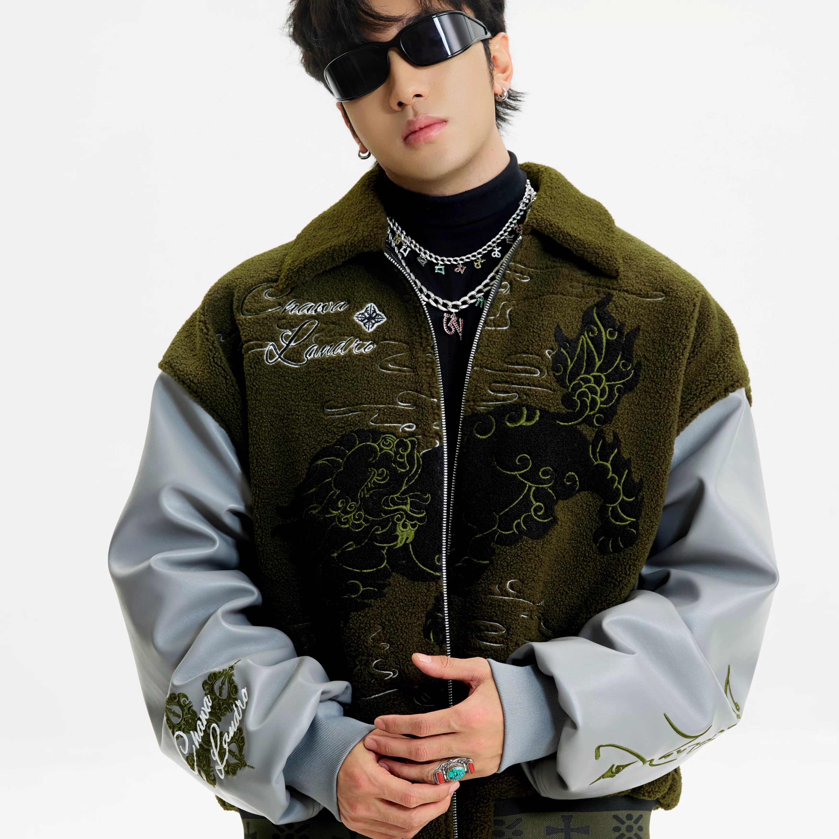 Sanhoostudio zip-up leather jacket with sherpa lining for warmth. Designed for unisex winter streetwear and comfort.