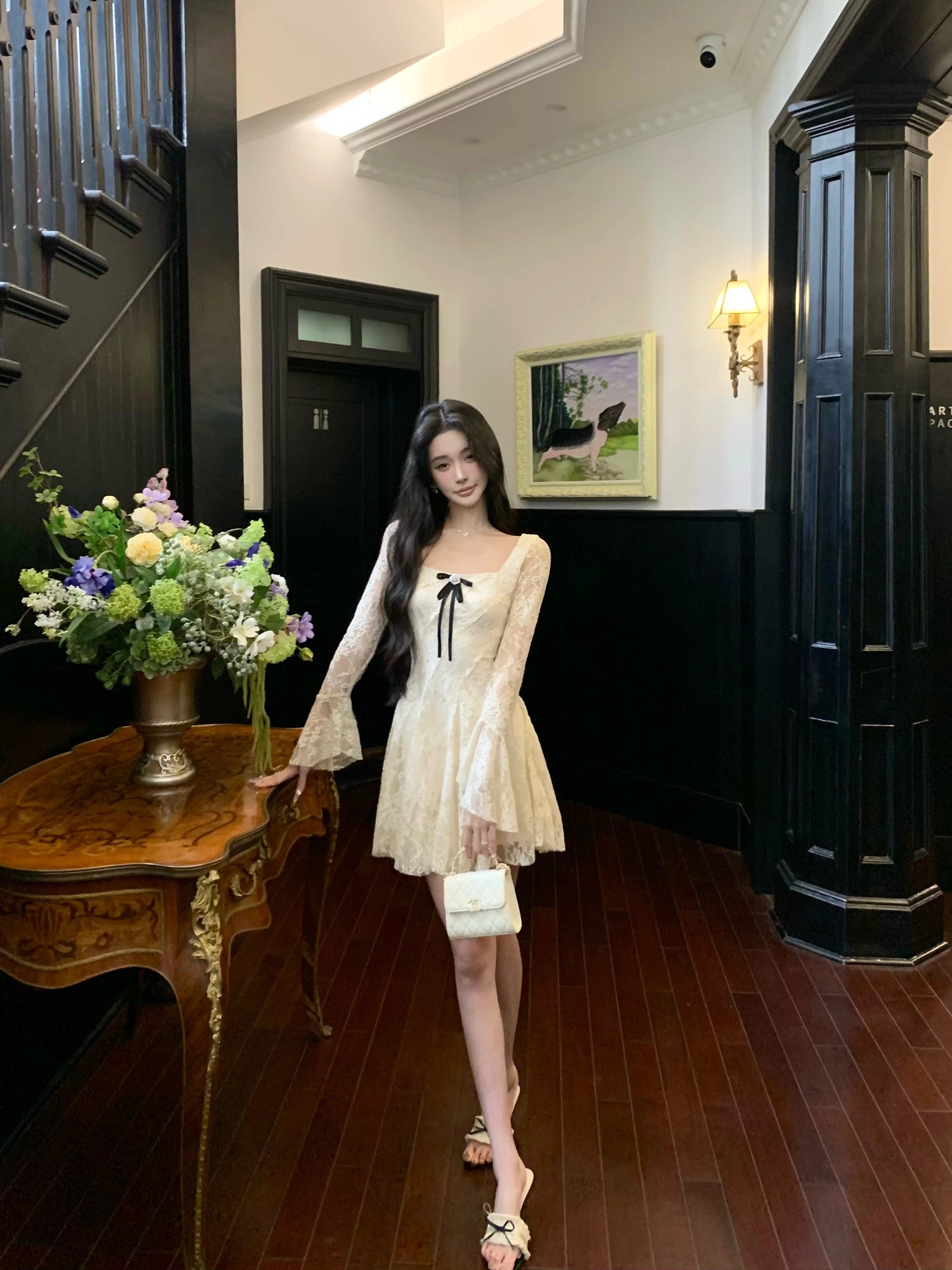 Sanhoostudio presents the Lace Bow Long Sleeve Dress, a charming piece with lace and bow accents, perfect for birthdays and autumn gatherings.