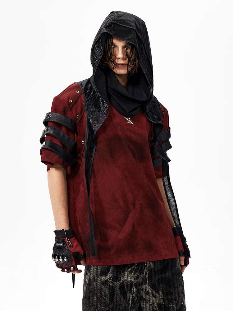 Sanhoostudio dark streetwear T-shirt featuring distressed dye finish, studded details, and leather patchwork accents. Designed with structured shoulder pads and a relaxed fit for bold summer styling.