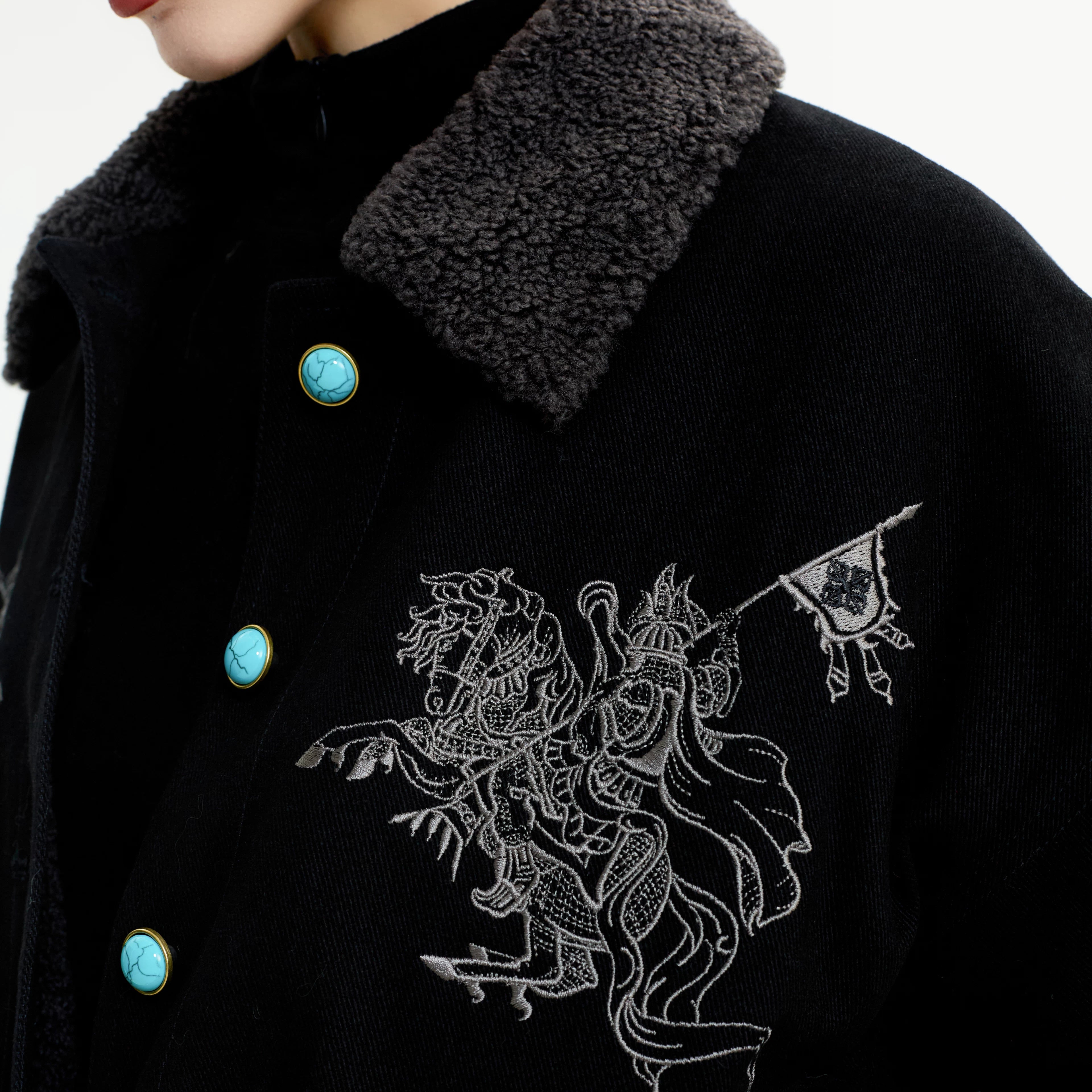 Sanhoostudio fleece-lined jacket designed for warmth and comfort. A unisex winter outerwear piece with relaxed streetwear style.