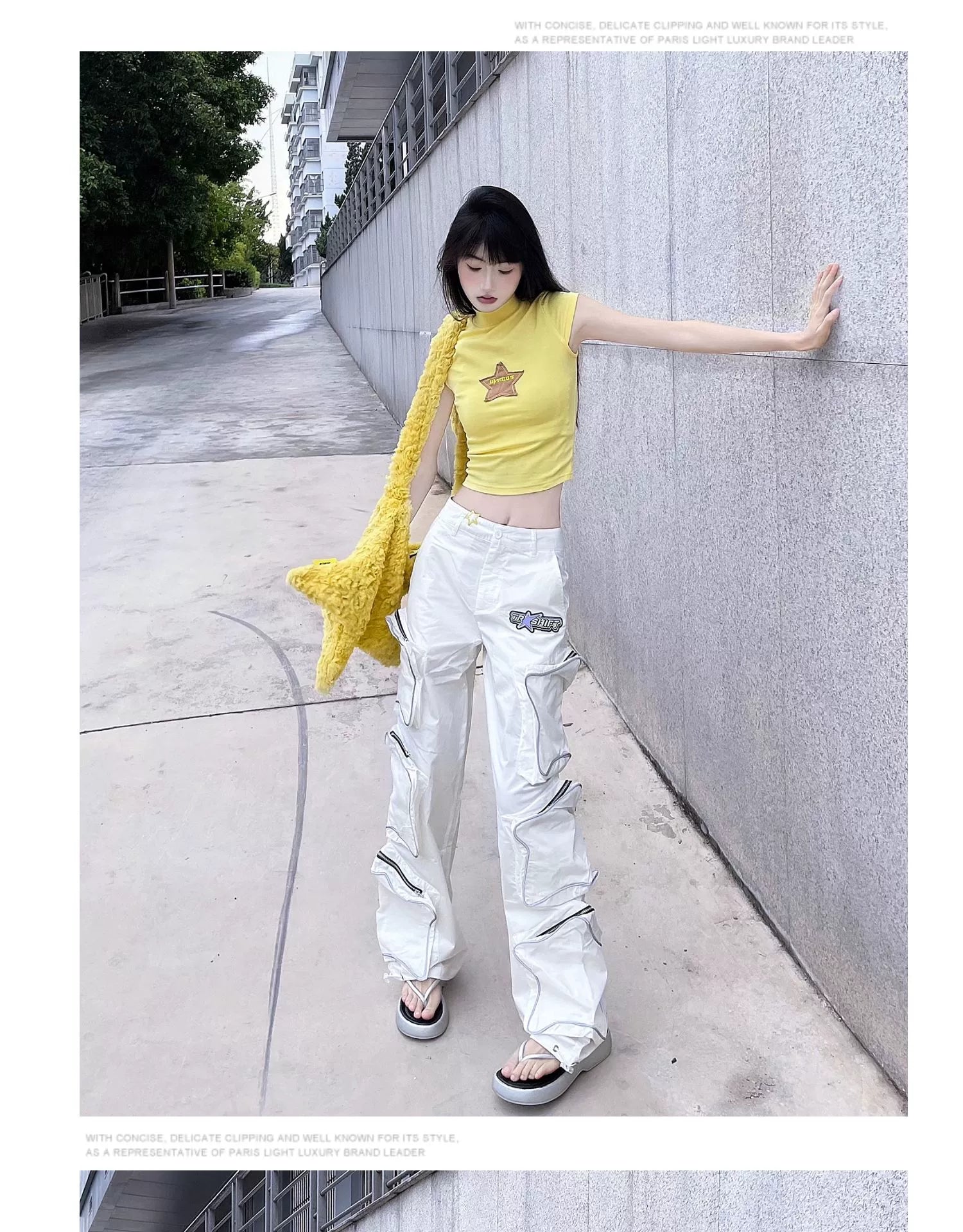 These reflective cargo pants from Sanhoostudio feature 3D star patches and bold avant-garde styling. The oversized fit and dark aesthetic make them ideal for nightwear, performance looks, or urban outfits, blending futuristic energy with functional streetwear practicality.