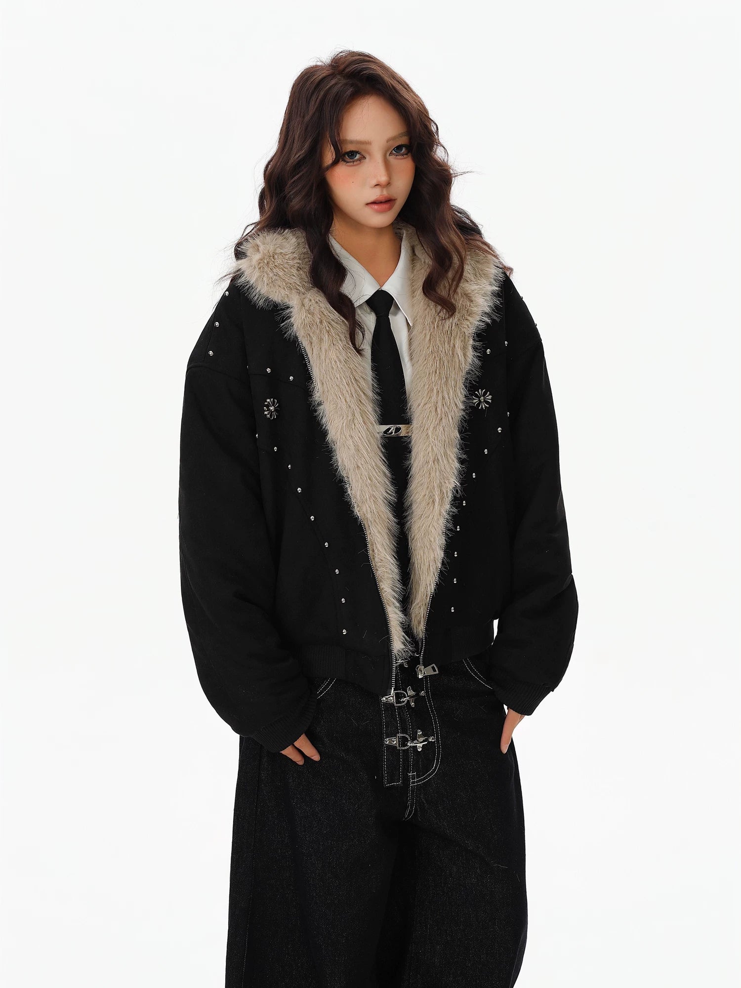 Sanhoostudio padded jacket with fur collar and hooded design, featuring mountain eagle detailing and stud accents. Built for warmth with a structured streetwear silhouette for winter styling.