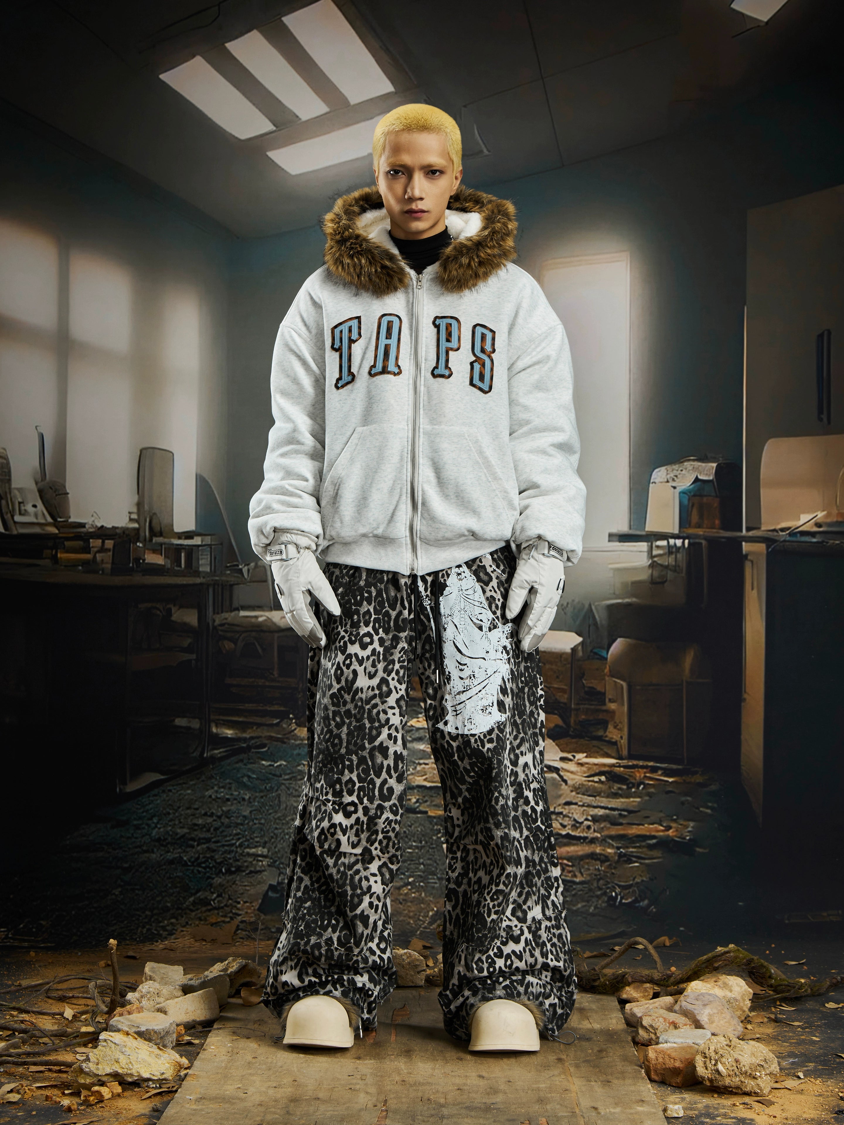 A bold leopard patchwork hooded puffer jacket with color-block faux-fur details. Designed by Sanhoostudio for standout winter street layering and heavy warm comfort.