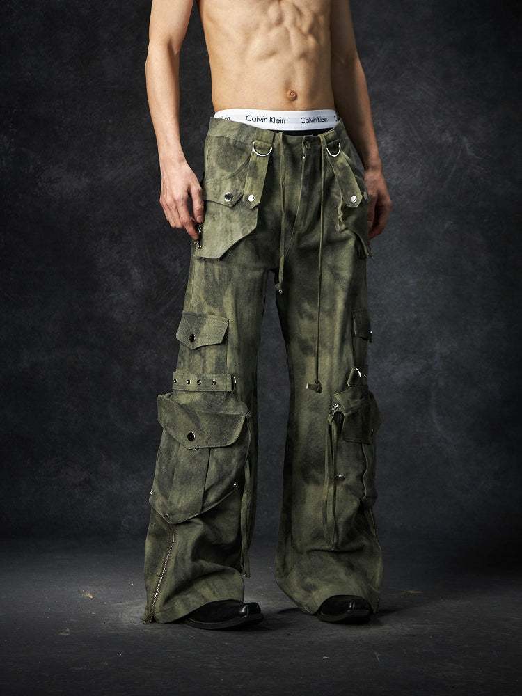 The Sanhoostudio distressed mud-dye cargo pants feature a heavy washed finish, rugged multi-pocket design, and a relaxed straight-leg fit. Perfect for utilitarian and high street styling, they combine functionality with bold design, making them an essential statement for everyday streetwear wardrobes.