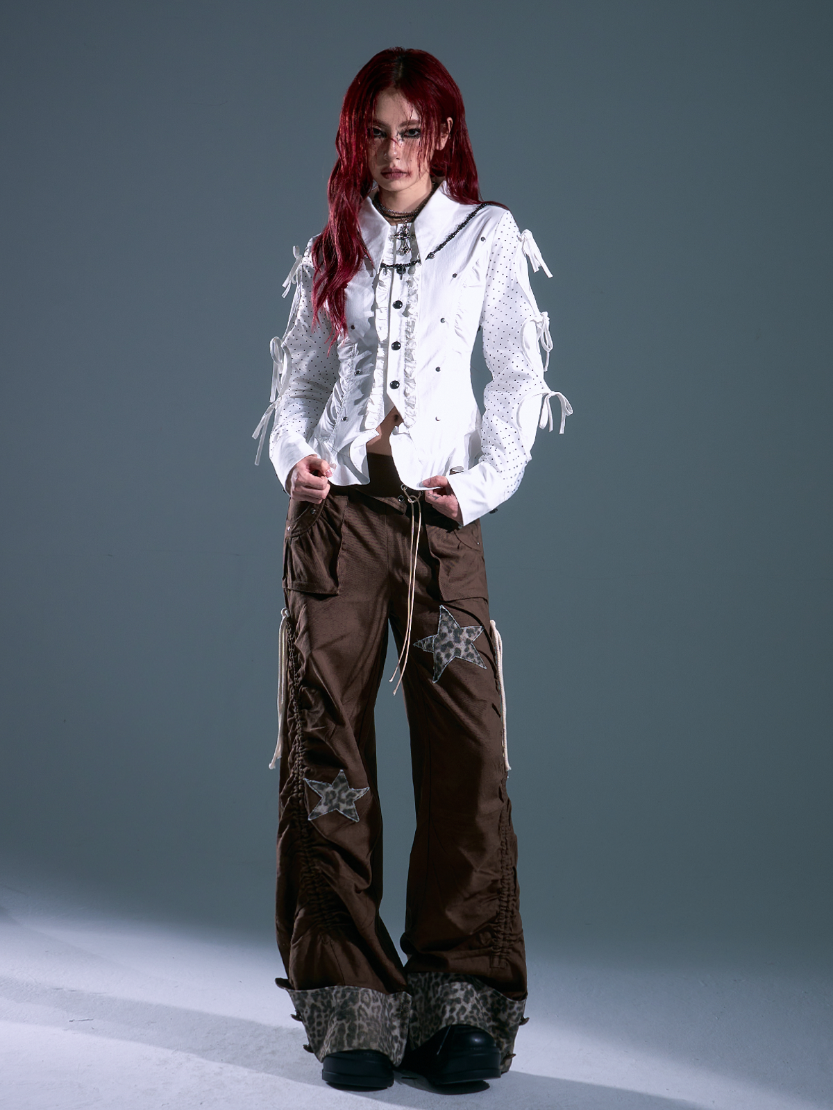 Sanhoostudio’s retro polka dot ruffled waist shirt features a slim fit, delicate tie details, and vintage-inspired elegance. Perfect for stylish streetwear and casual chic outfits.