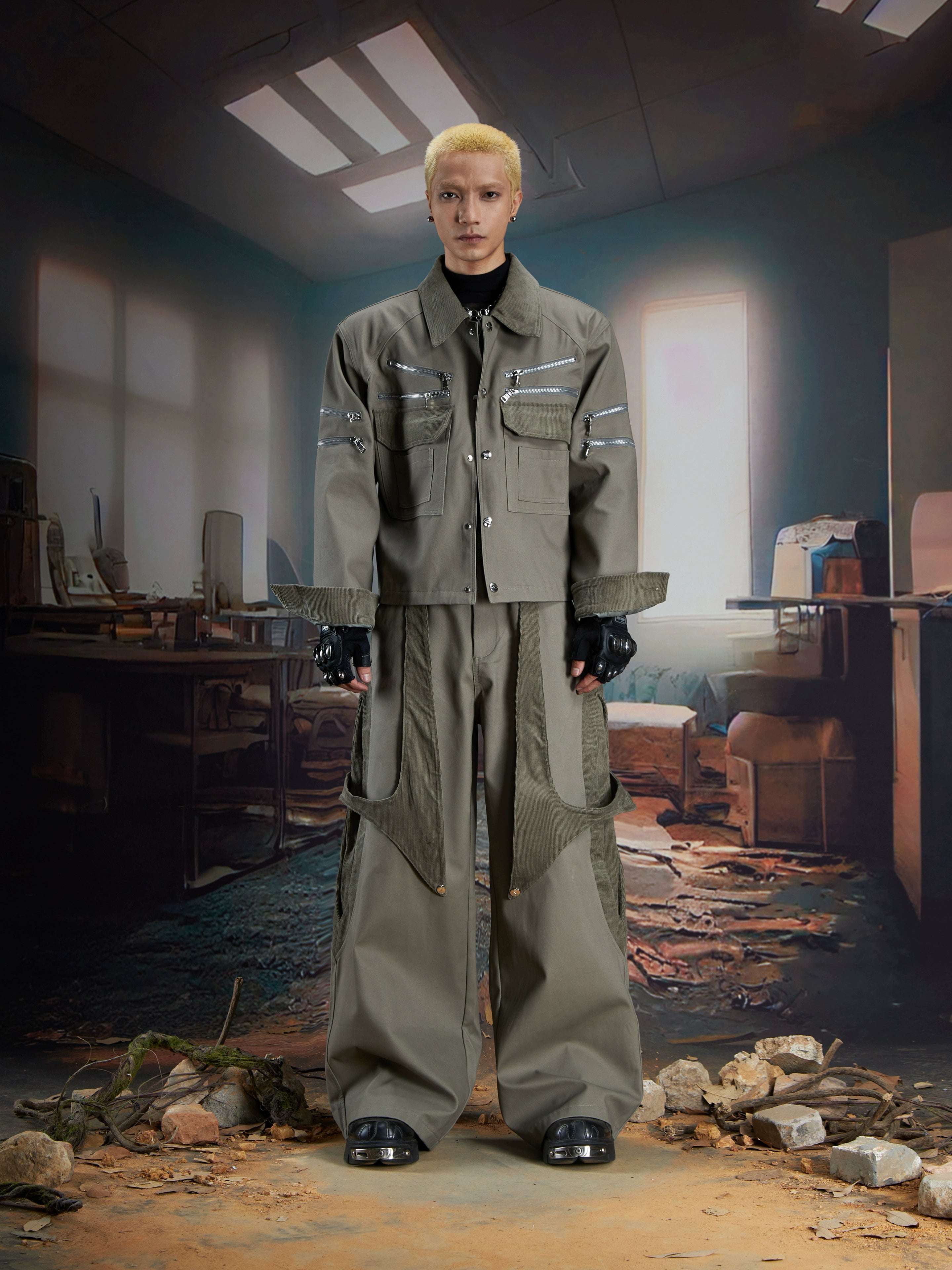 This deconstructed corduroy panel jacket combines zippers, button details, and a short cut for a unique retro look. Its relaxed fit makes it a standout layering piece. Shop original outerwear at Sanhoostudio.