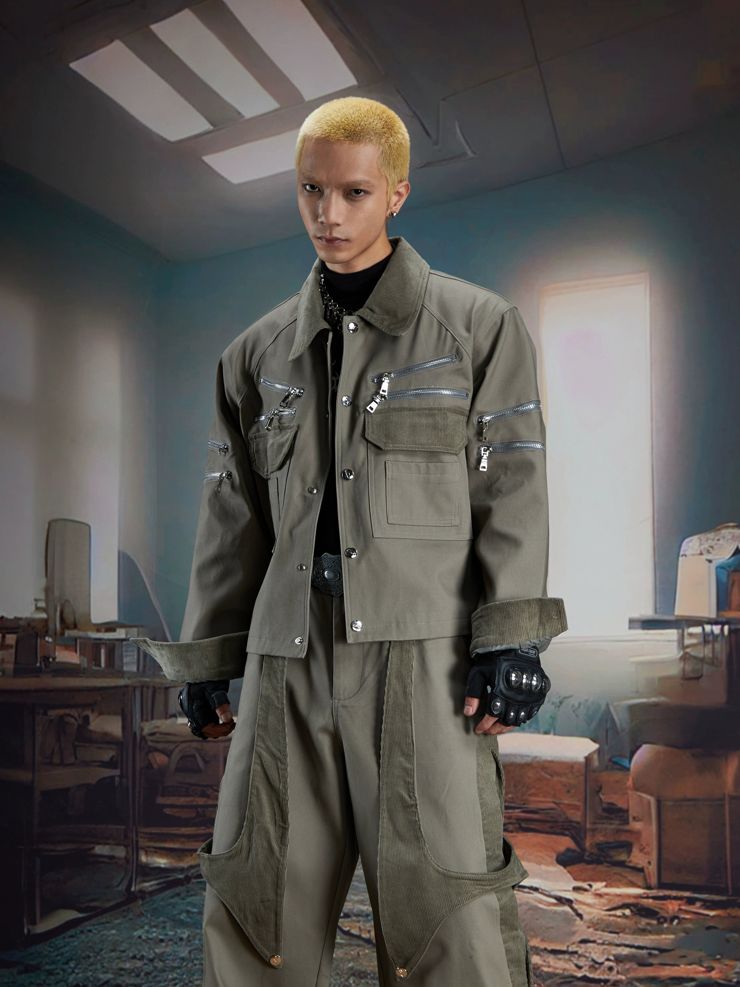 This deconstructed corduroy panel jacket combines zippers, button details, and a short cut for a unique retro look. Its relaxed fit makes it a standout layering piece. Shop original outerwear at Sanhoostudio.