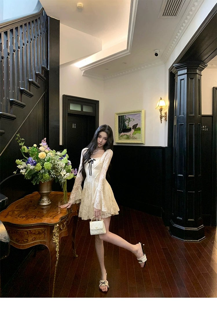 Sanhoostudio presents the Lace Bow Long Sleeve Dress, a charming piece with lace and bow accents, perfect for birthdays and autumn gatherings.