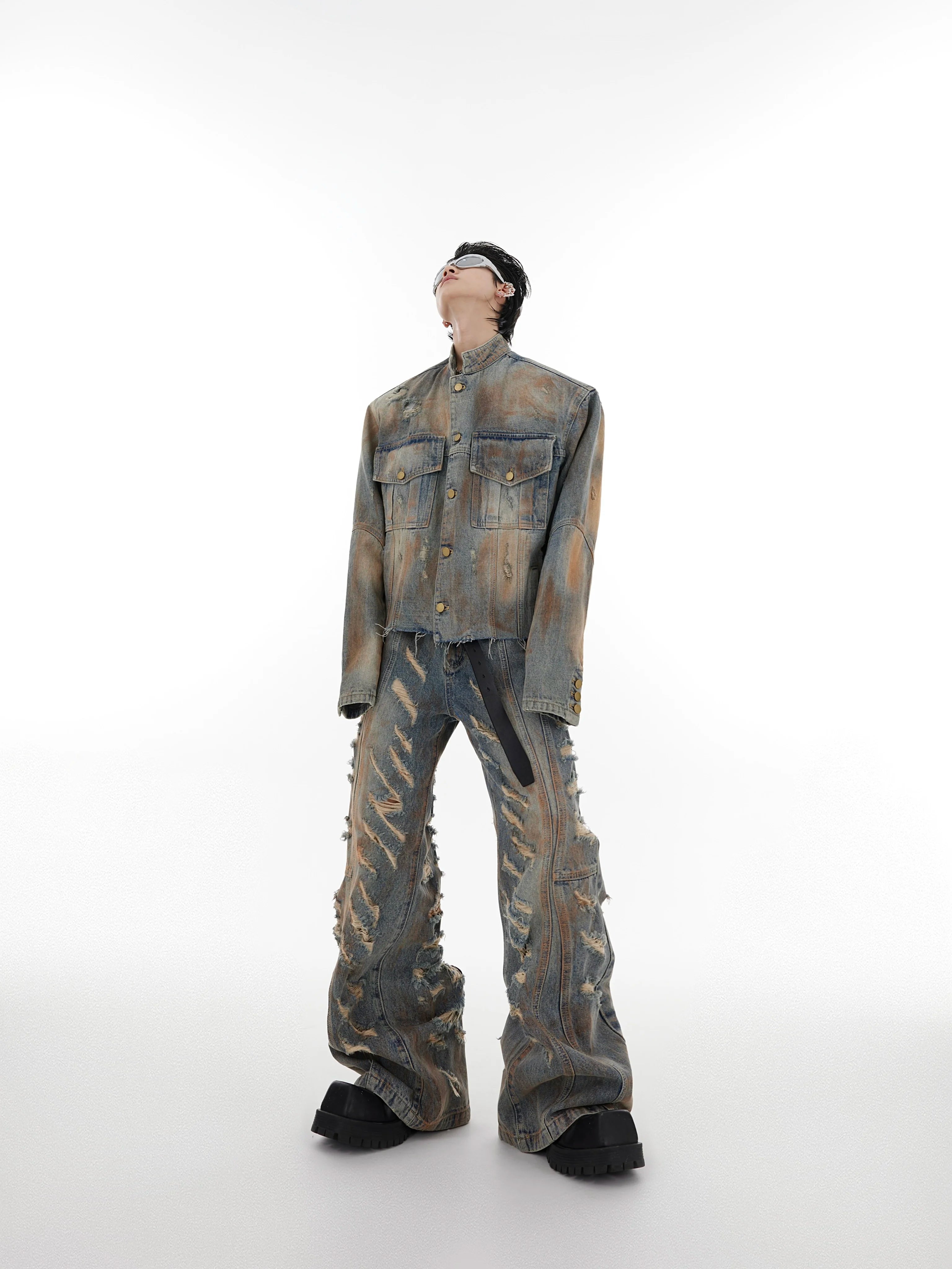 Sanhoostudio denim set featuring a distressed jacket and flared jeans. Designed with a vintage wasteland aesthetic and heavyweight washed finish.