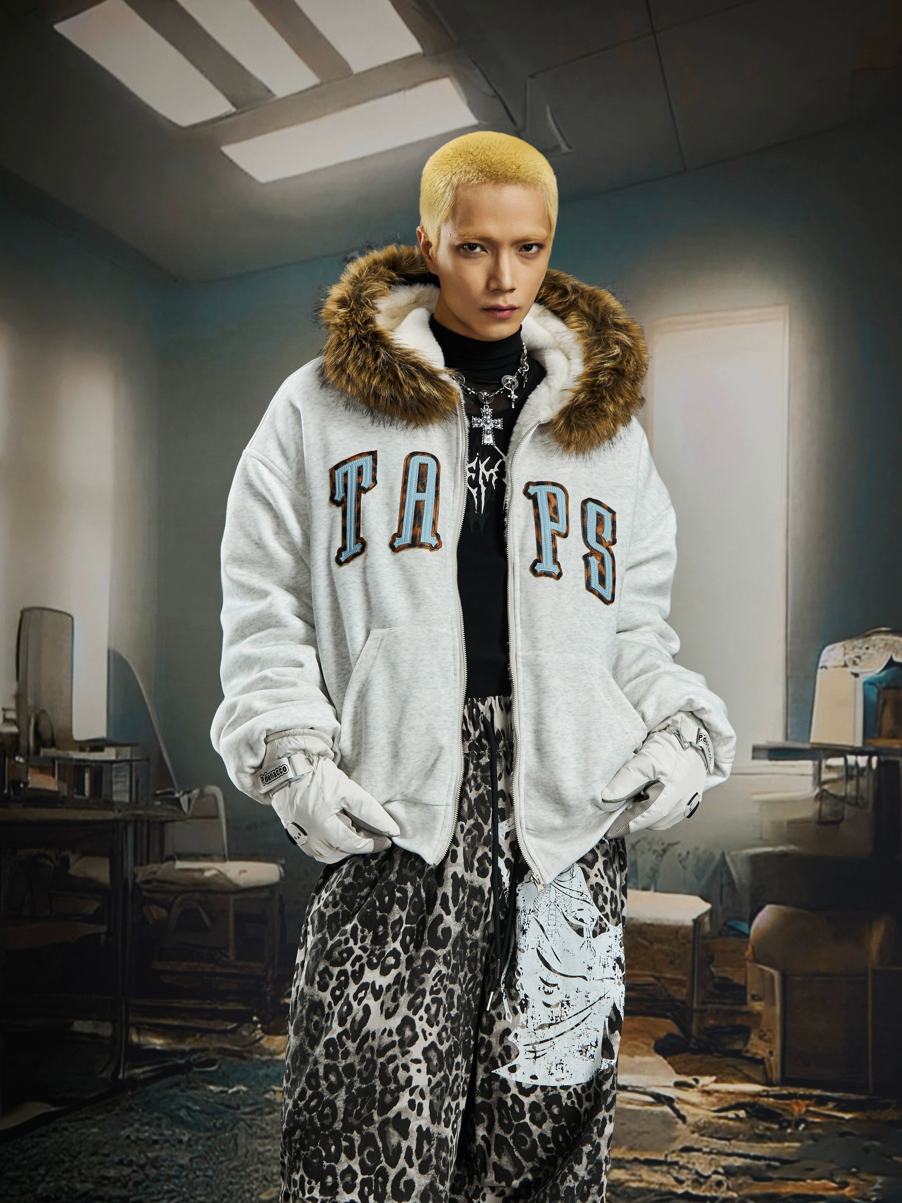 A bold leopard patchwork hooded puffer jacket with color-block faux-fur details. Designed by Sanhoostudio for standout winter street layering and heavy warm comfort.