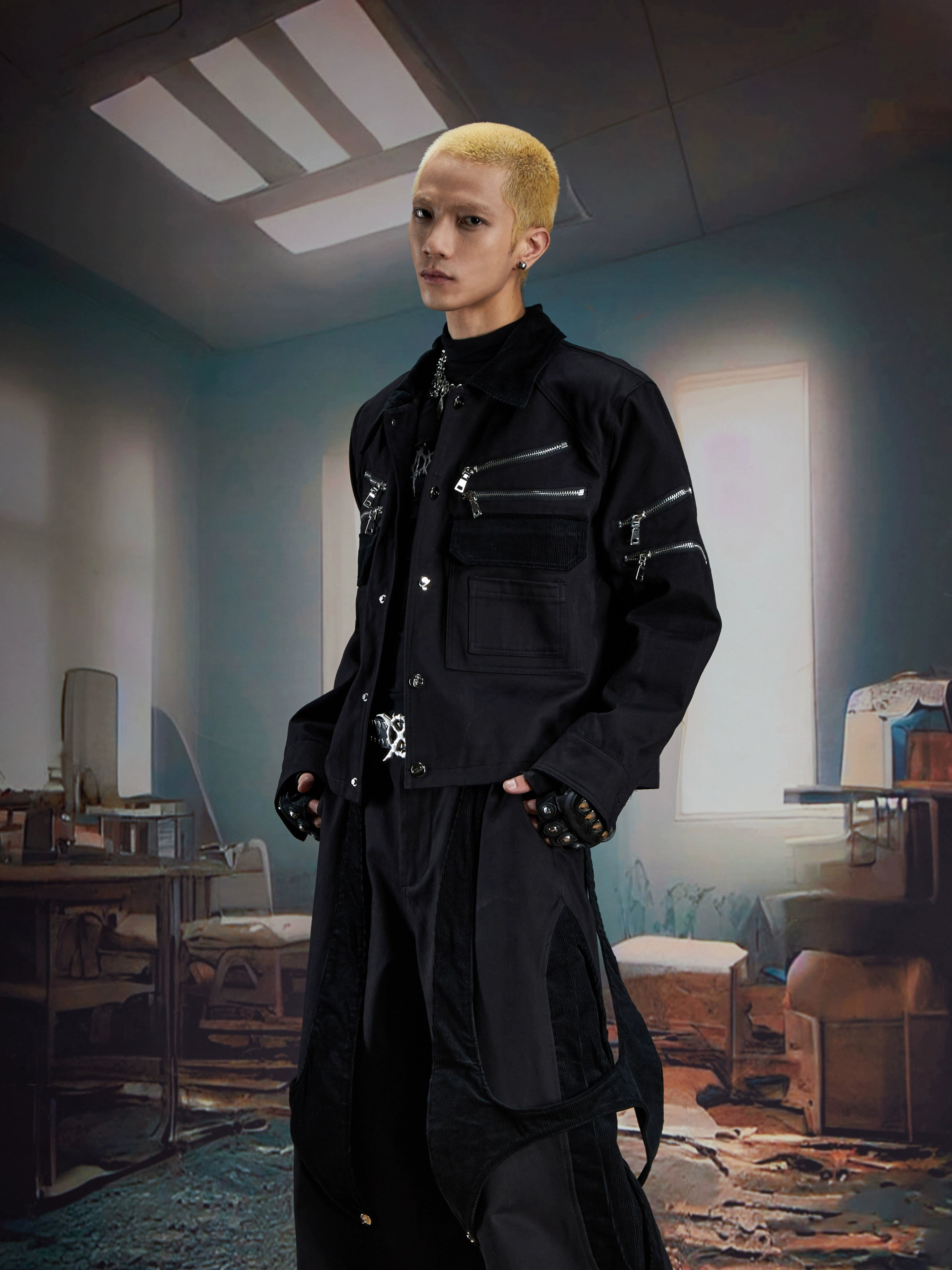 This deconstructed corduroy panel jacket combines zippers, button details, and a short cut for a unique retro look. Its relaxed fit makes it a standout layering piece. Shop original outerwear at Sanhoostudio.