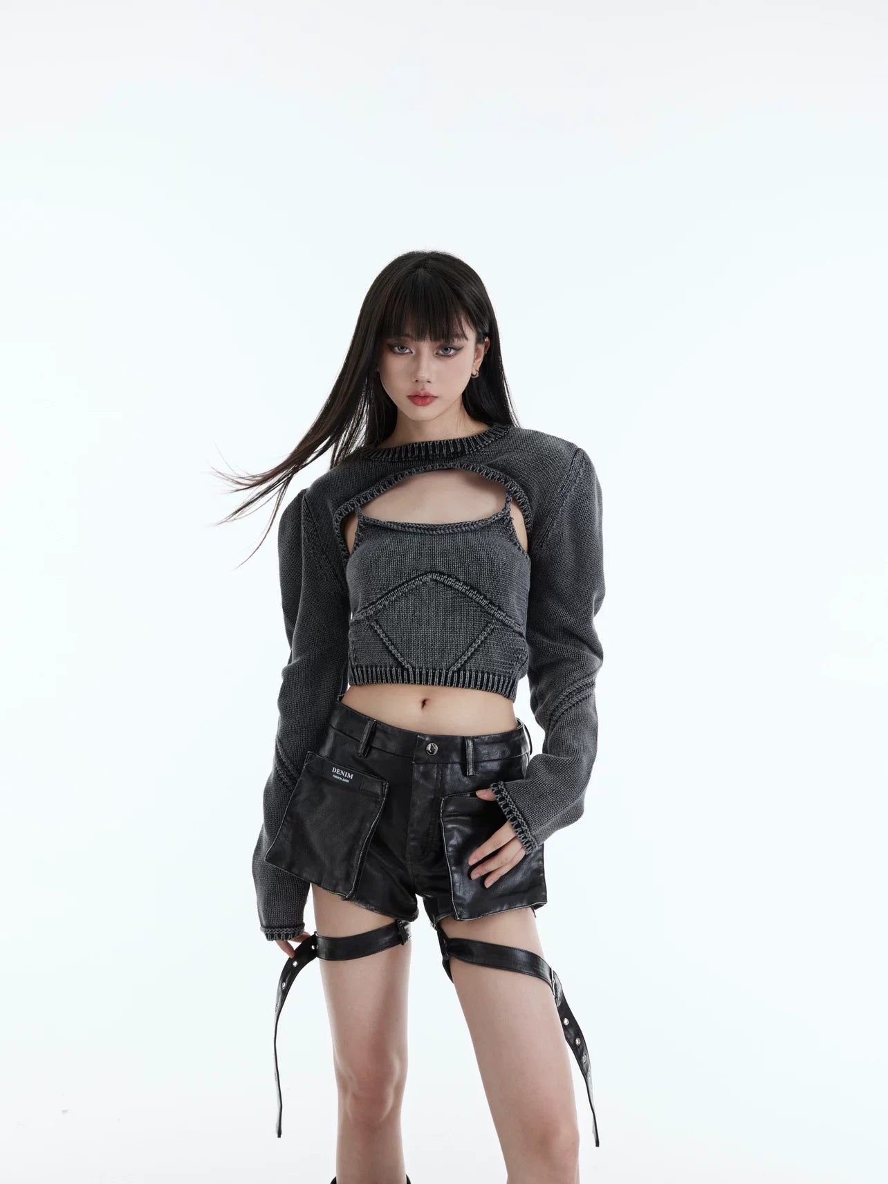 Sanhoostudio two-piece knit set featuring a washed vintage finish. Includes a cropped knit top and relaxed shawl-style outer layer.