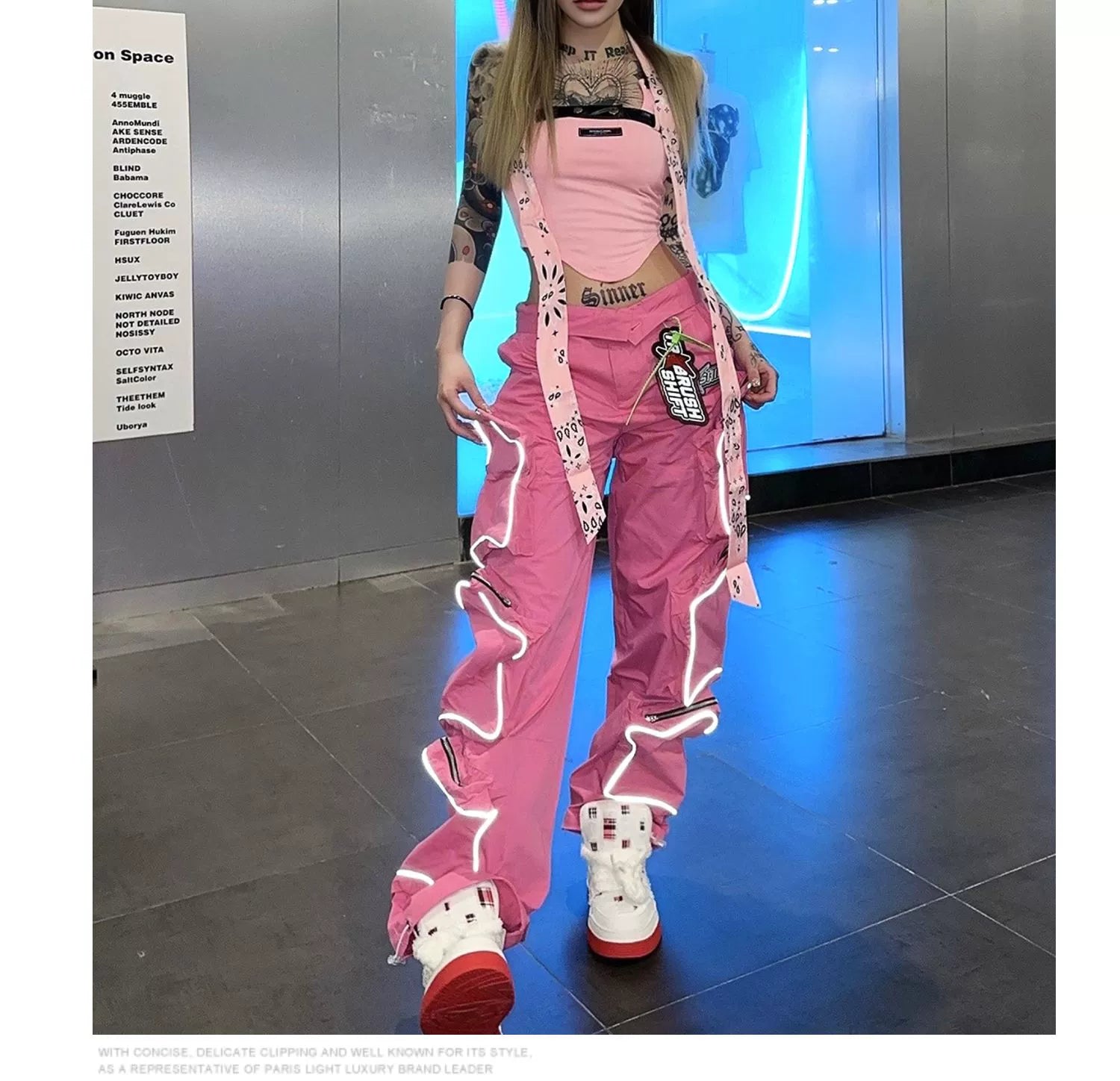 These reflective cargo pants from Sanhoostudio feature 3D star patches and bold avant-garde styling. The oversized fit and dark aesthetic make them ideal for nightwear, performance looks, or urban outfits, blending futuristic energy with functional streetwear practicality.