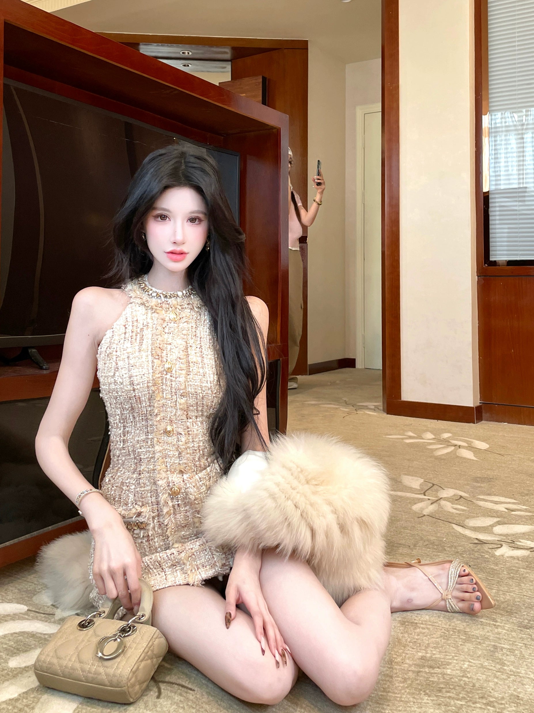 Sanhoostudio presents the Chic Tweed Halter Bodycon Dress, a luxurious piece with refined textures, blending modern charm with timeless elegance.