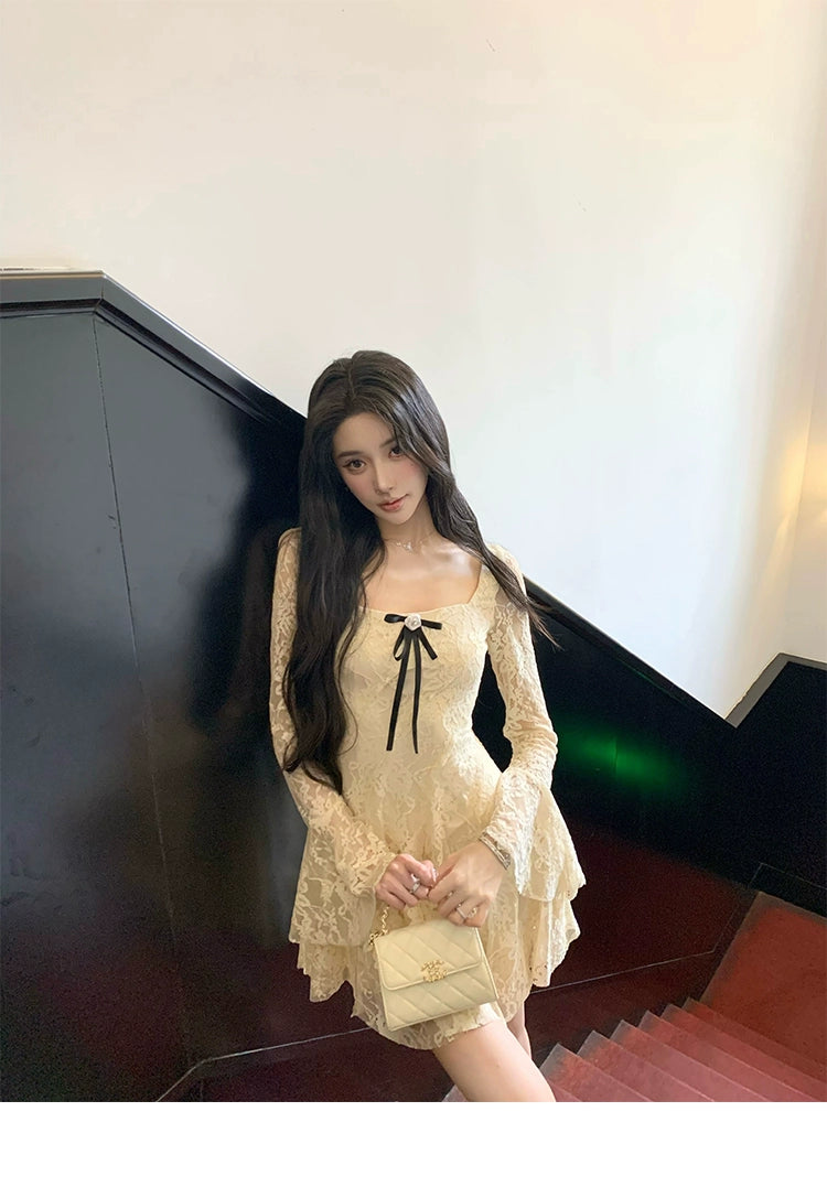 Sanhoostudio presents the Lace Bow Long Sleeve Dress, a charming piece with lace and bow accents, perfect for birthdays and autumn gatherings.