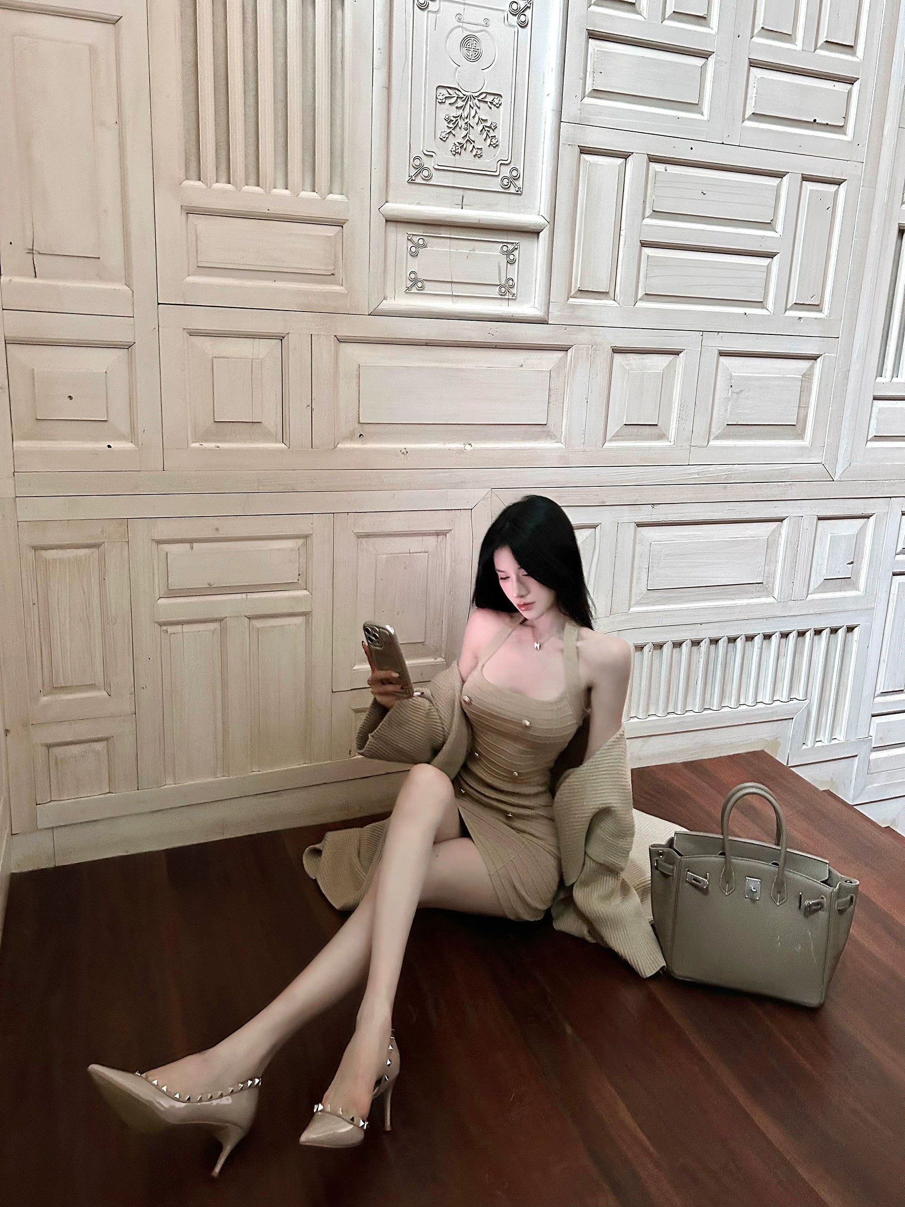 Shop the Sexy Chic Knit Halter Dress from Sanhoostudio, a bodycon knit mini dress with a modern halter neckline, perfect for parties and casual wear.