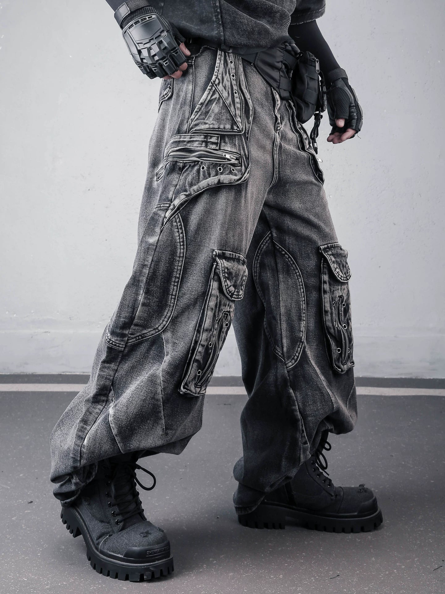 Sanhoostudio denim cargo pants featuring deconstructed design, multi-pocket construction, and scythe-cut wide leg silhouette. Built for functional streetwear styling with durability, comfort, and a strong urban utility look.