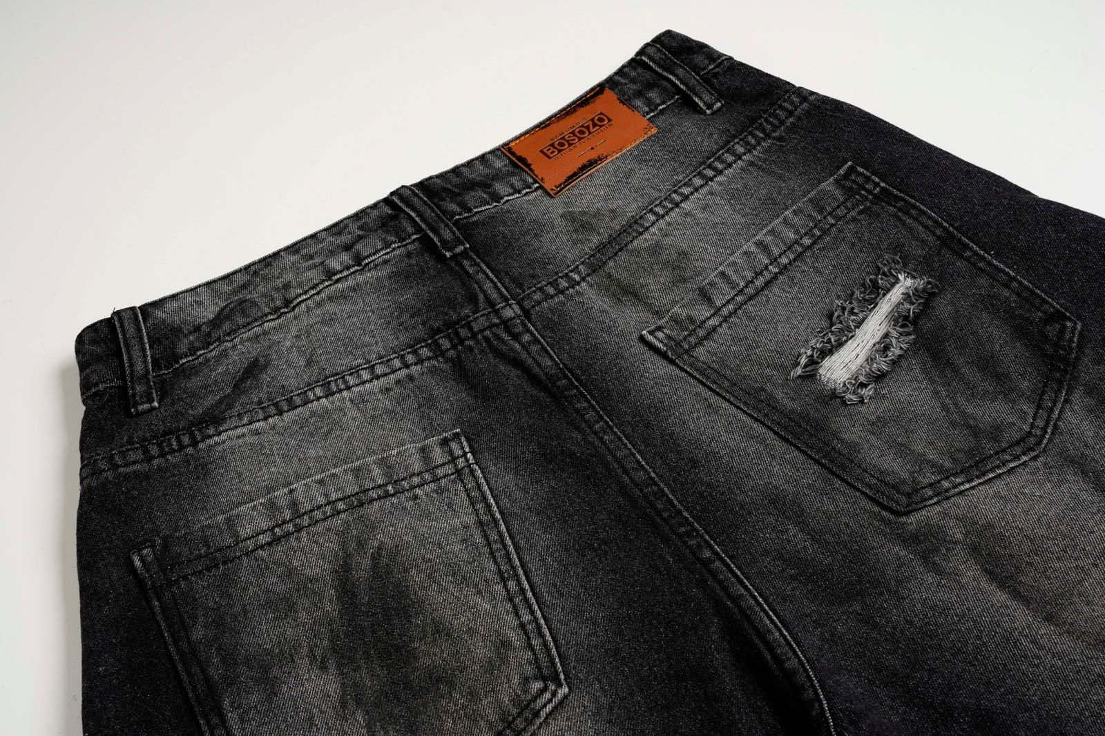These dirty-dyed washed jeans feature bold stripe accents, multiple utility pockets, and a vintage worn-in finish. With a loose, streetwear-inspired fit, they’re perfect for creating a rugged, edgy look. Ideal for urban and grunge fashion lovers.