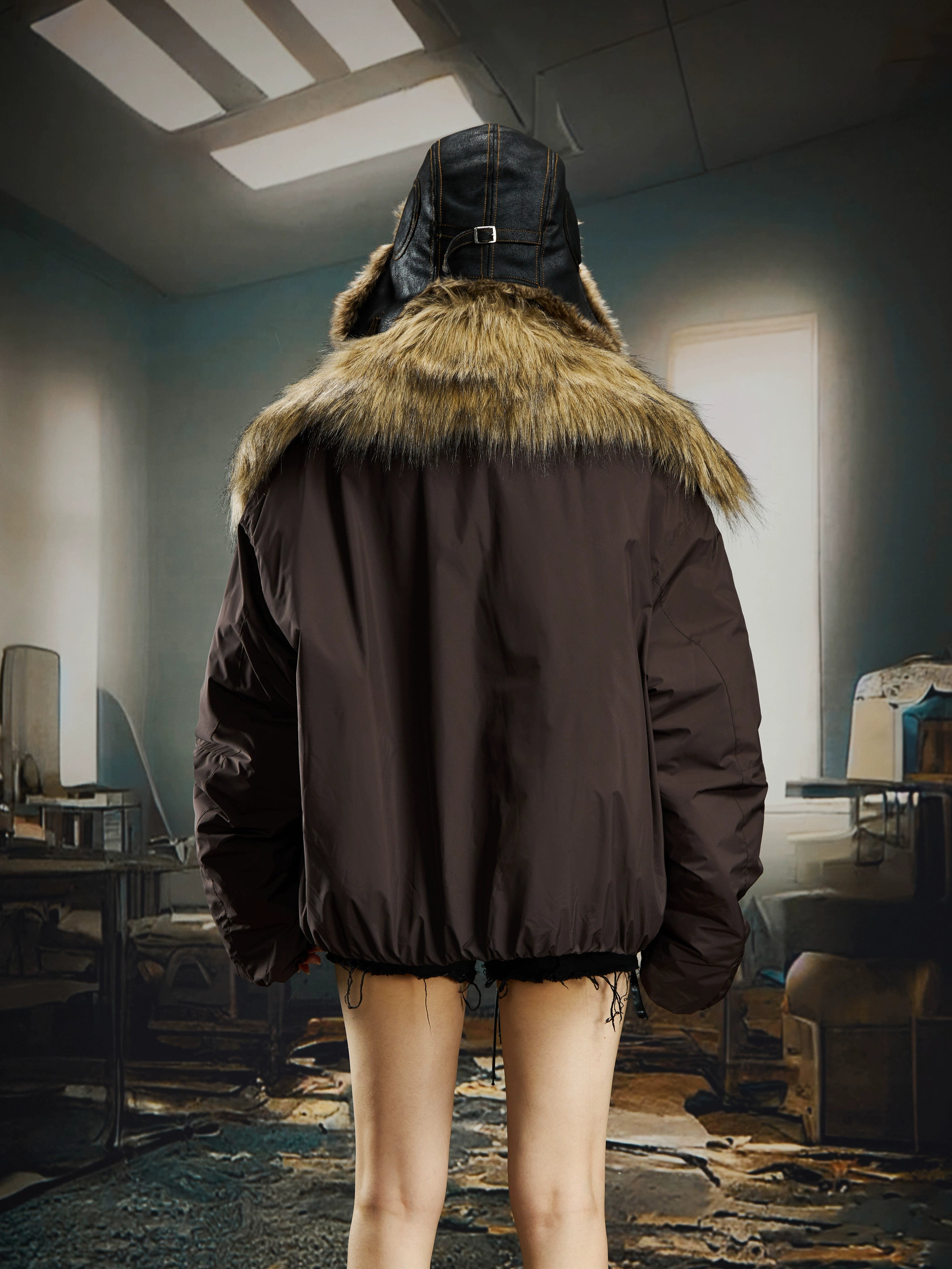 A luxurious wide-lapel cropped puffer with soft fur trim and thick padding. Designed by Sanhoostudio for high-street winter styling with a bold silhouette.