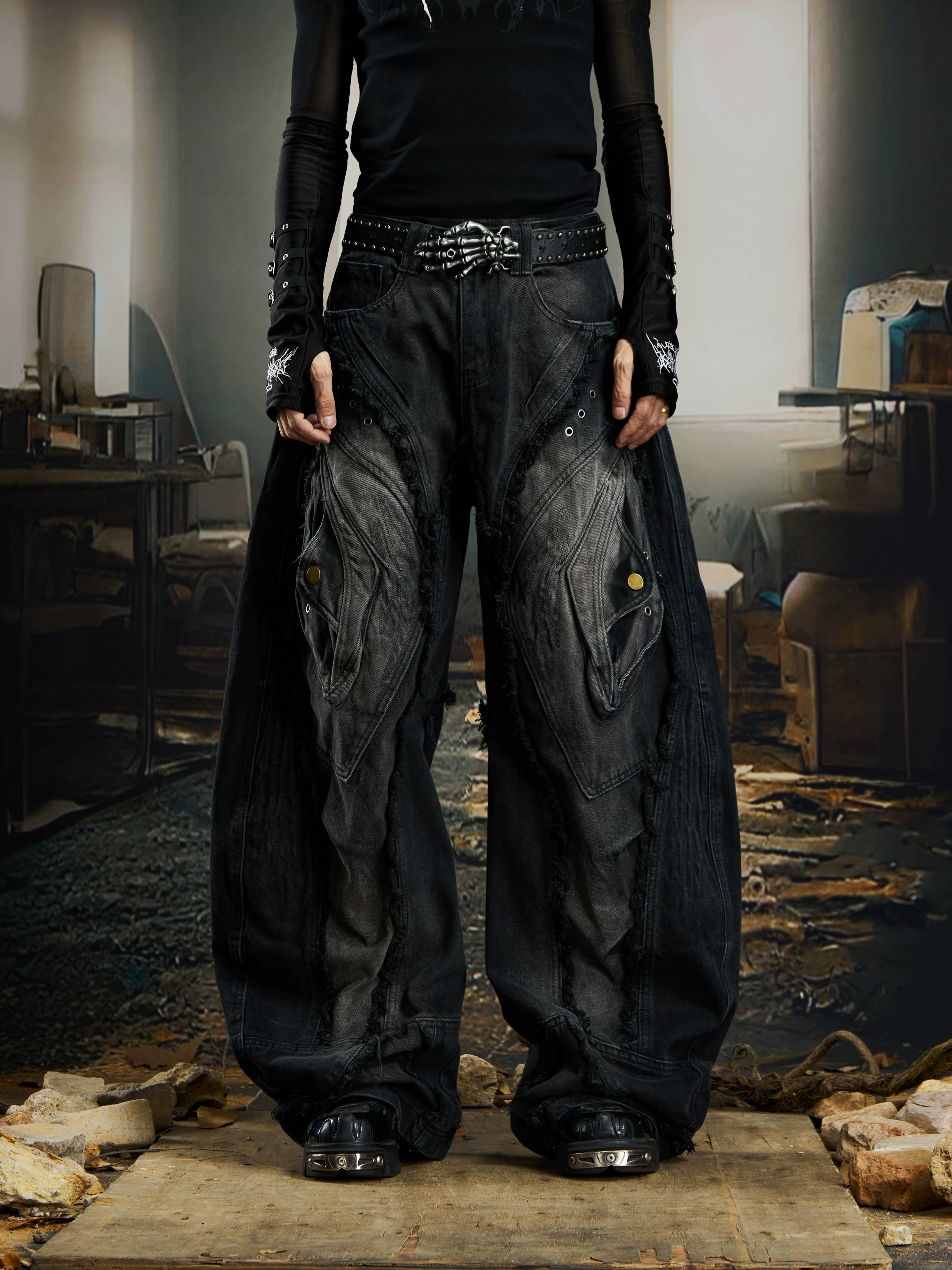 Extreme deconstructed blade-cut jeans with raw edges, washed fading, and a post-apocalyptic street silhouette. A signature Sanhoostudio statement.