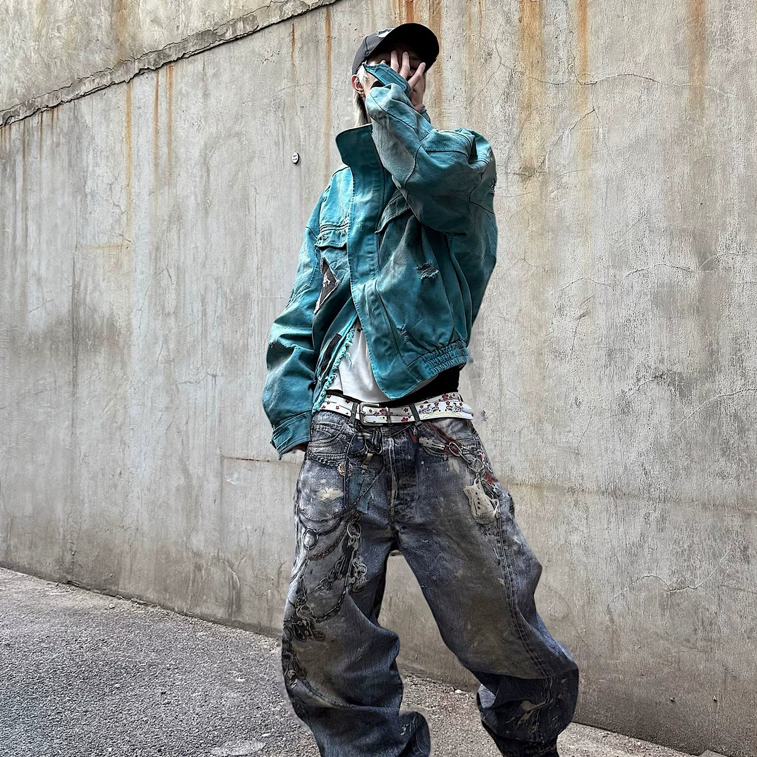 Sanhoostudio vintage-inspired canvas jacket crafted from 100% cotton. Featuring patchwork distressing, dyed finish, and a structured oversized fit that defines modern denim street style for all genders.