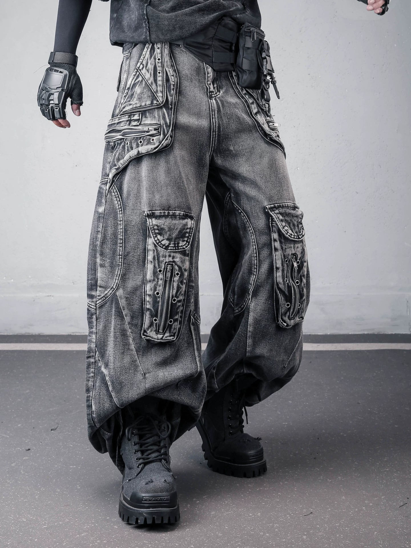 Sanhoostudio denim cargo pants featuring deconstructed design, multi-pocket construction, and scythe-cut wide leg silhouette. Built for functional streetwear styling with durability, comfort, and a strong urban utility look.