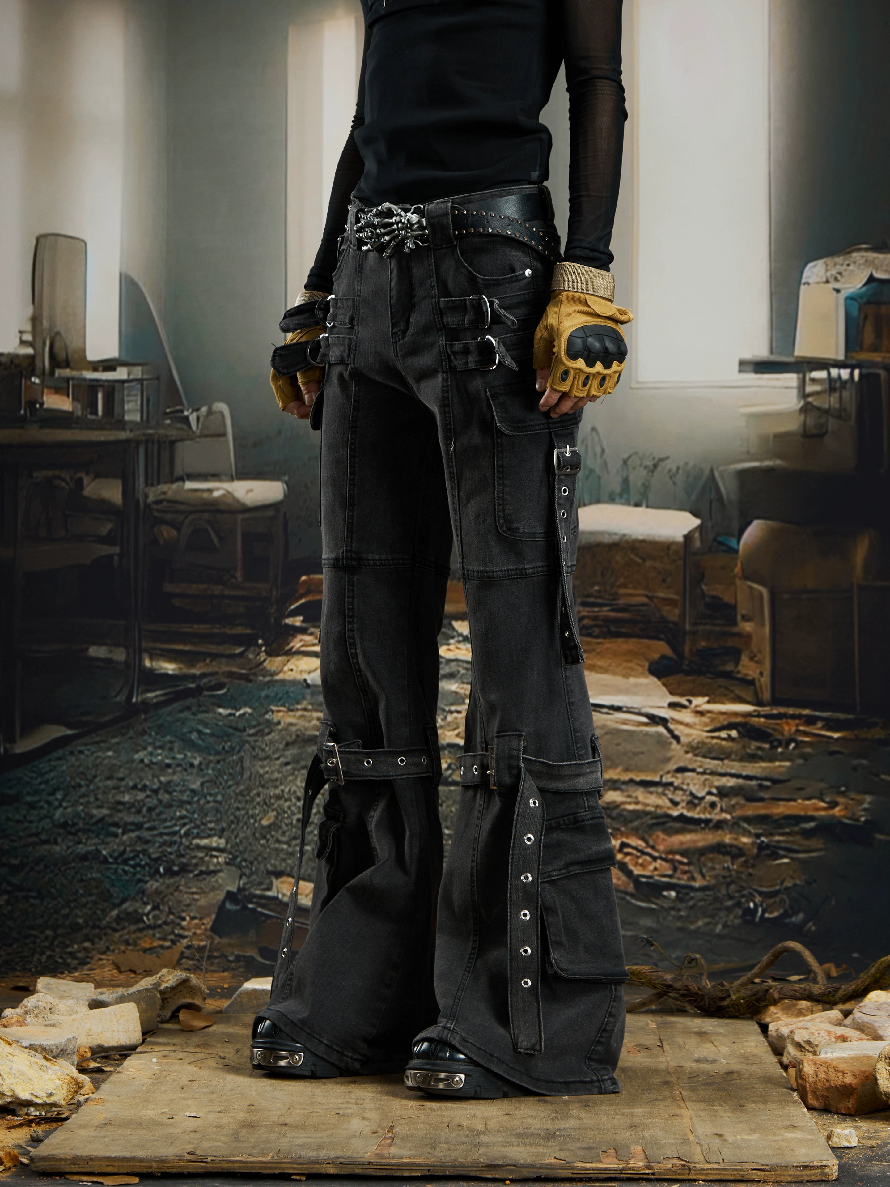 A Y2K-inspired deconstructed jean with ribbon panels and a subtle flare silhouette. Sanhoostudio’s signature dark street individuality.