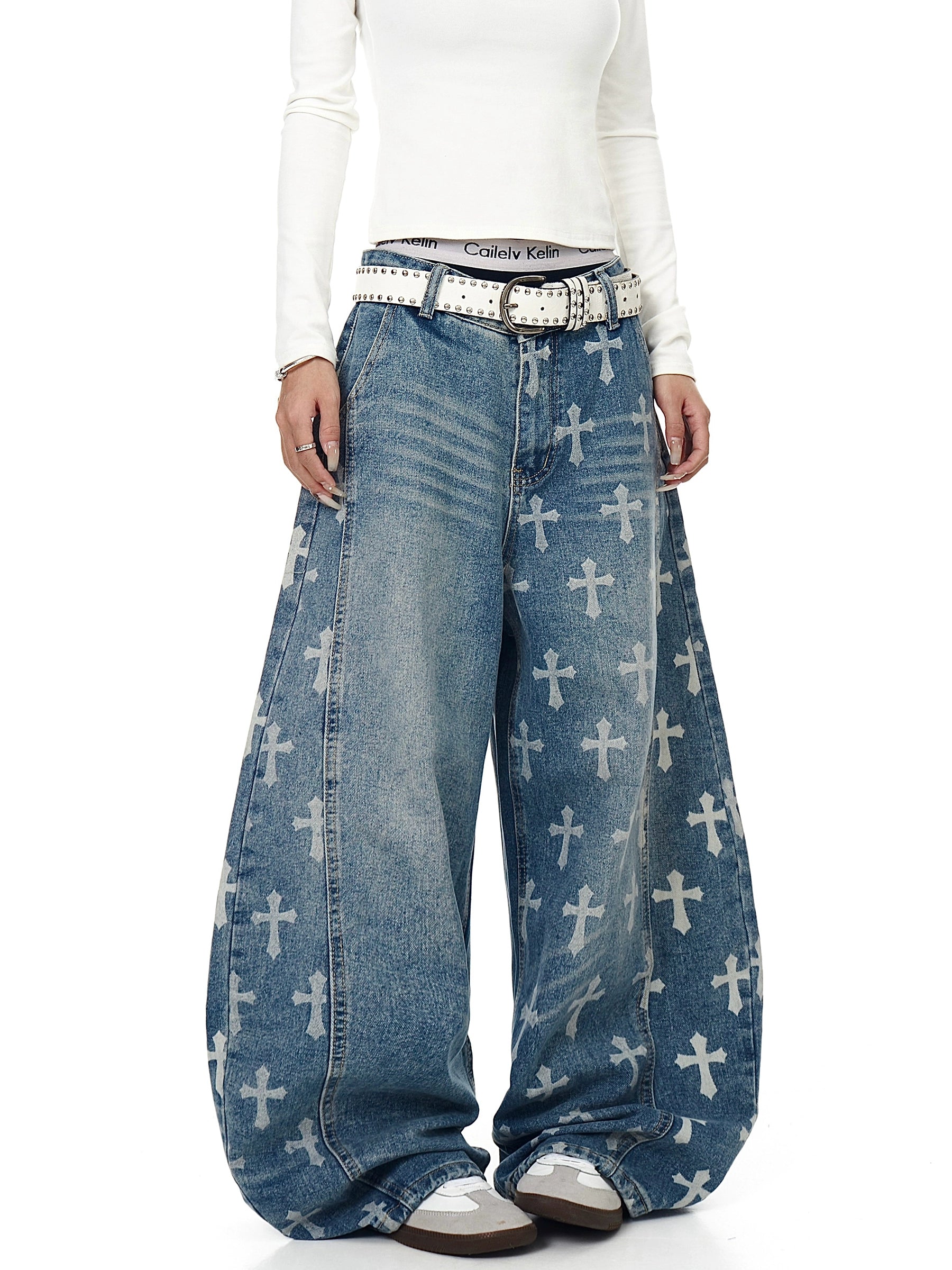 An icon of gothic rebellion — cross-printed denim with a relaxed wide-leg silhouette. Designed for high-street dreamers and underground believers by SanhooStudio.