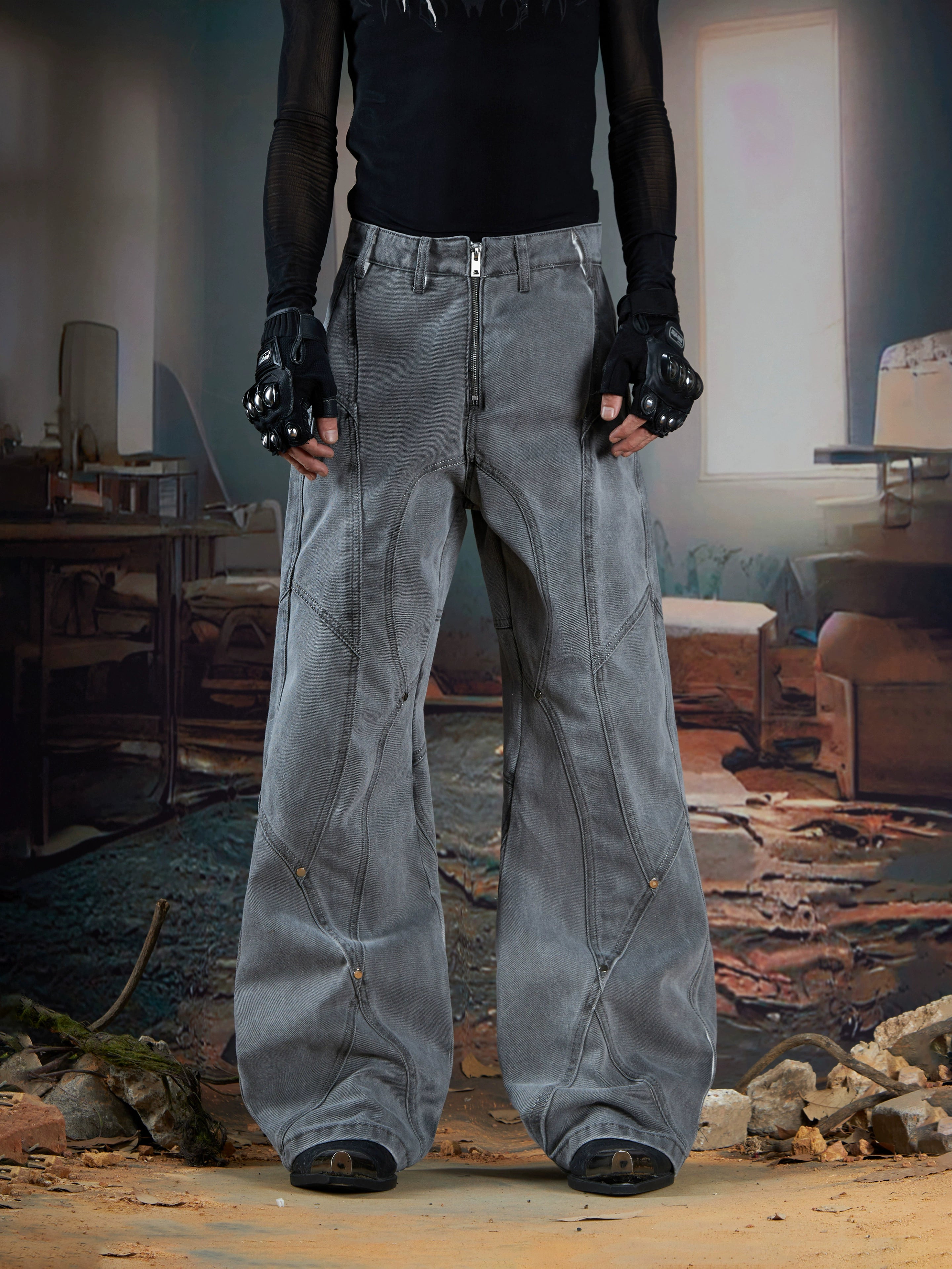 Rock an edgy look with these dark studded denim jeans, designed with structured panels and a slim-fit washed finish. Their subtle flare adds a touch of retro to punk-inspired outfits. Shop them at Sanhoostudio.