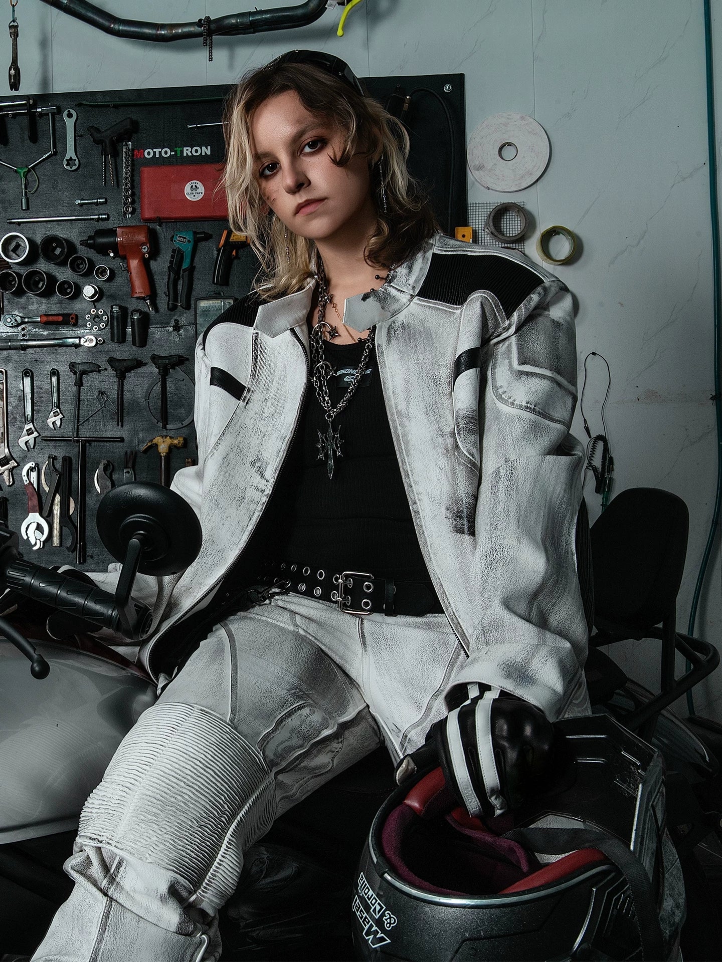Sanhoostudio leather jacket featuring distressed finish and relaxed fit for bold streetwear styling.