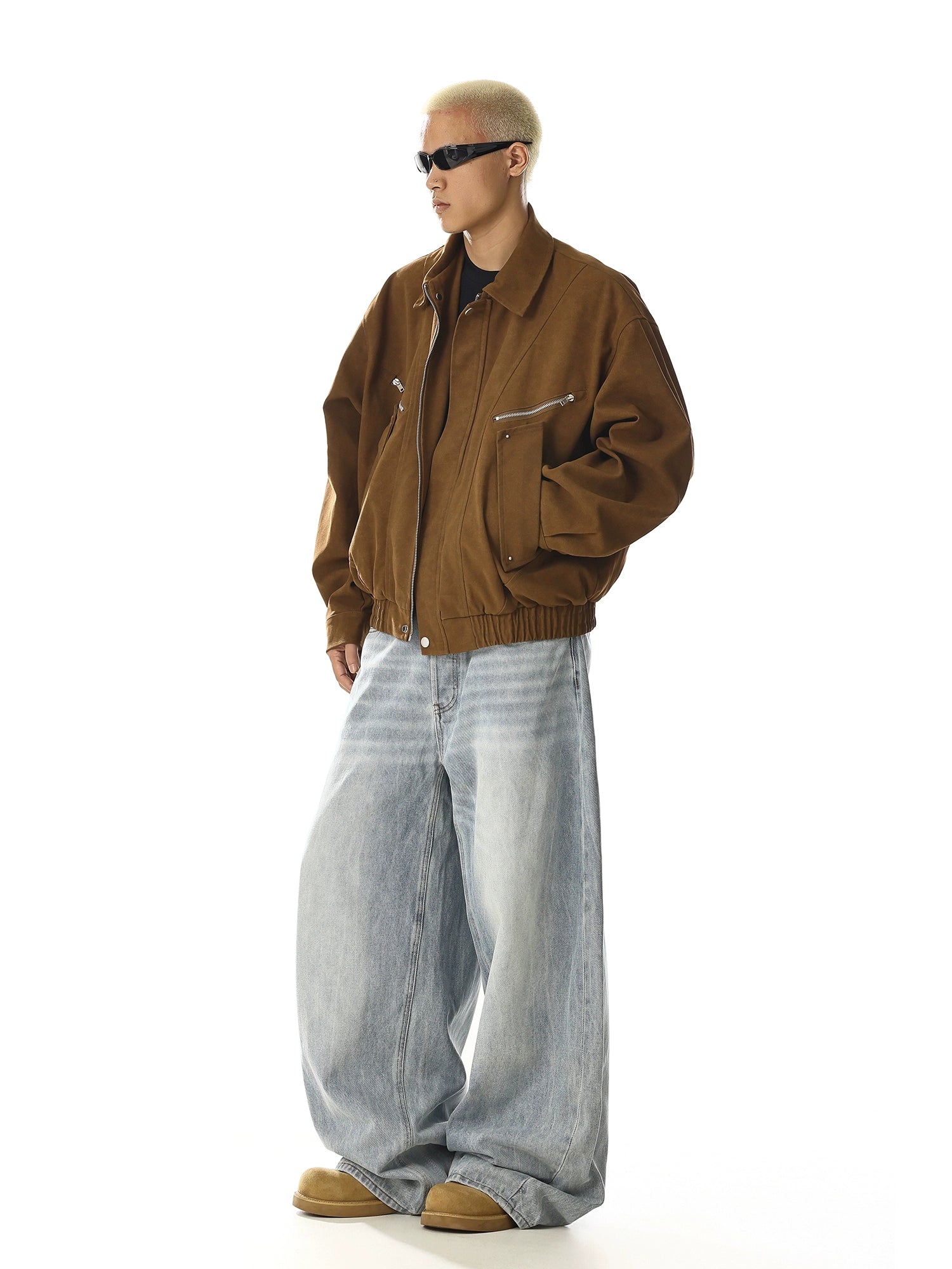 A vintage-inspired leather workwear jacket with multiple utility pockets and distressed detailing. Its oversized cut delivers both style and comfort for daily wear. Shop rugged leather outerwear at Sanhoostudio.