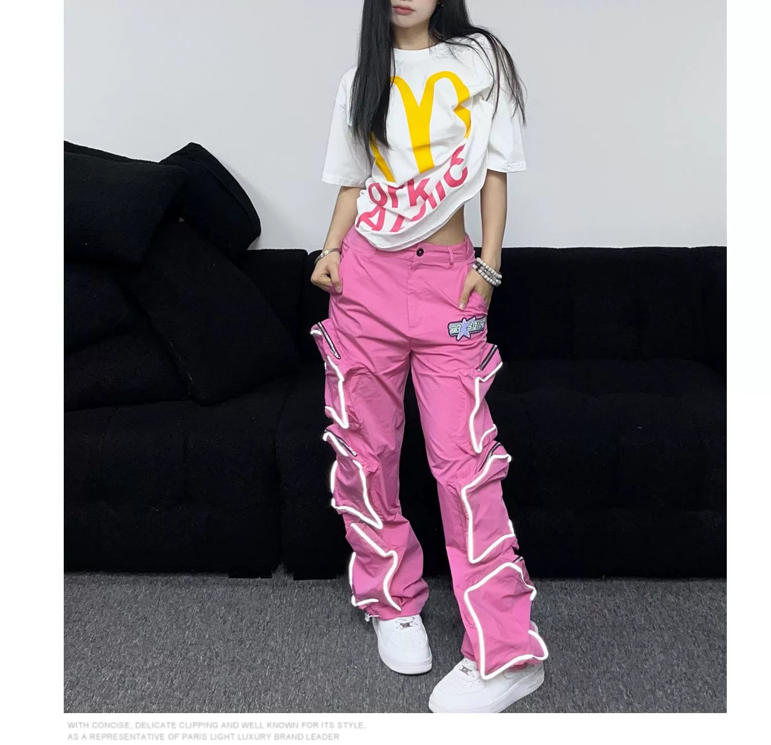 These reflective cargo pants from Sanhoostudio feature 3D star patches and bold avant-garde styling. The oversized fit and dark aesthetic make them ideal for nightwear, performance looks, or urban outfits, blending futuristic energy with functional streetwear practicality.