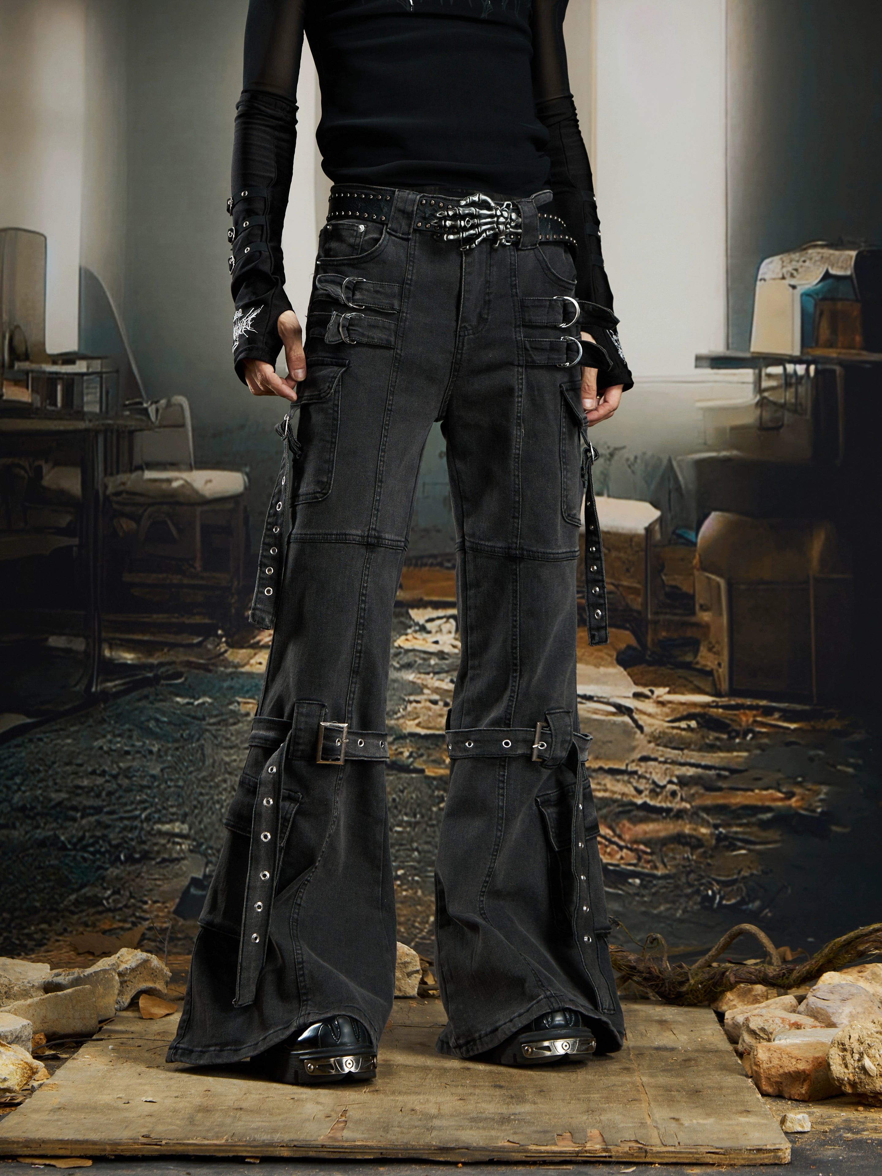 A Y2K-inspired deconstructed jean with ribbon panels and a subtle flare silhouette. Sanhoostudio’s signature dark street individuality.