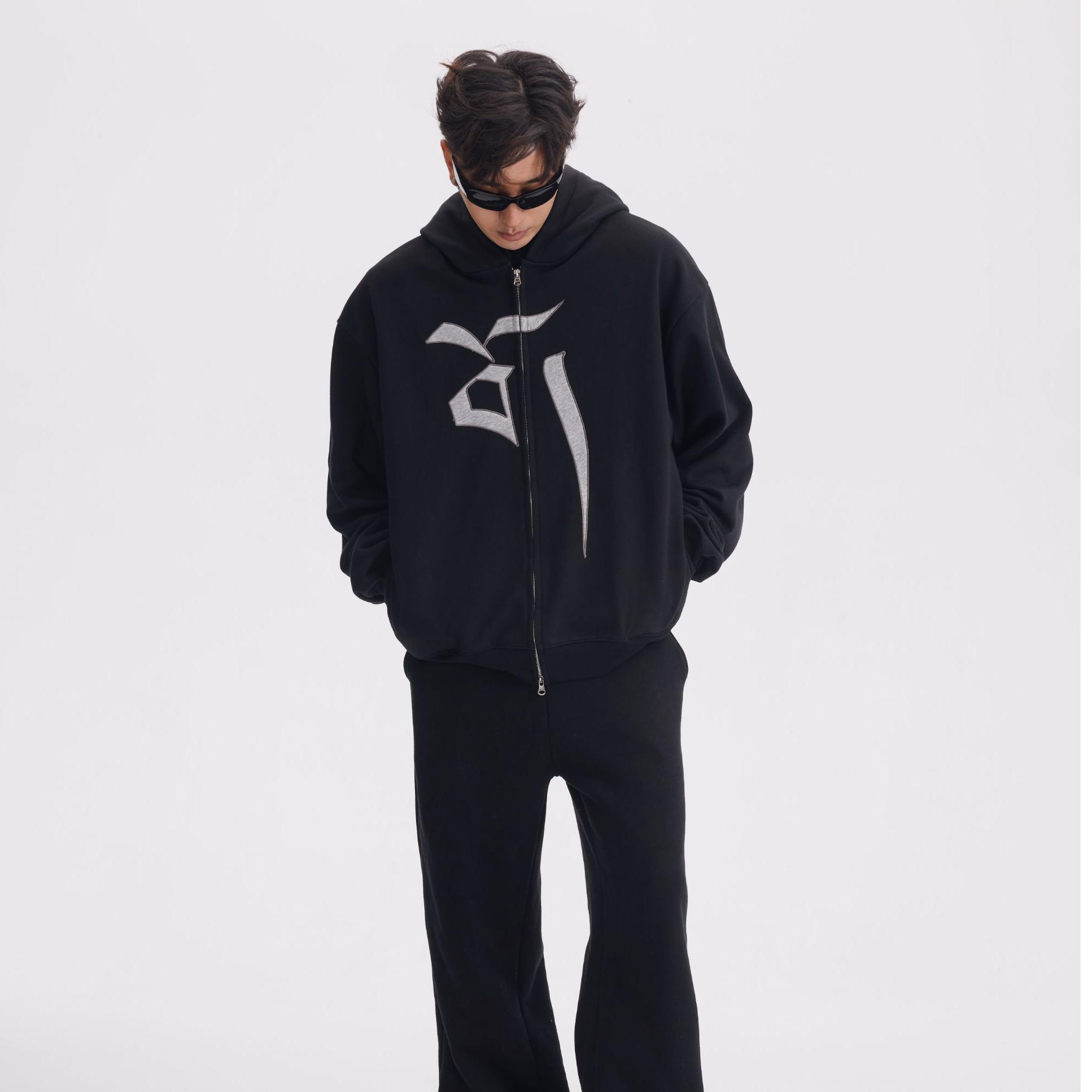 Sanhoostudio hooded sweatshirt featuring Vajra-inspired design and relaxed oversized fit for unisex streetwear.