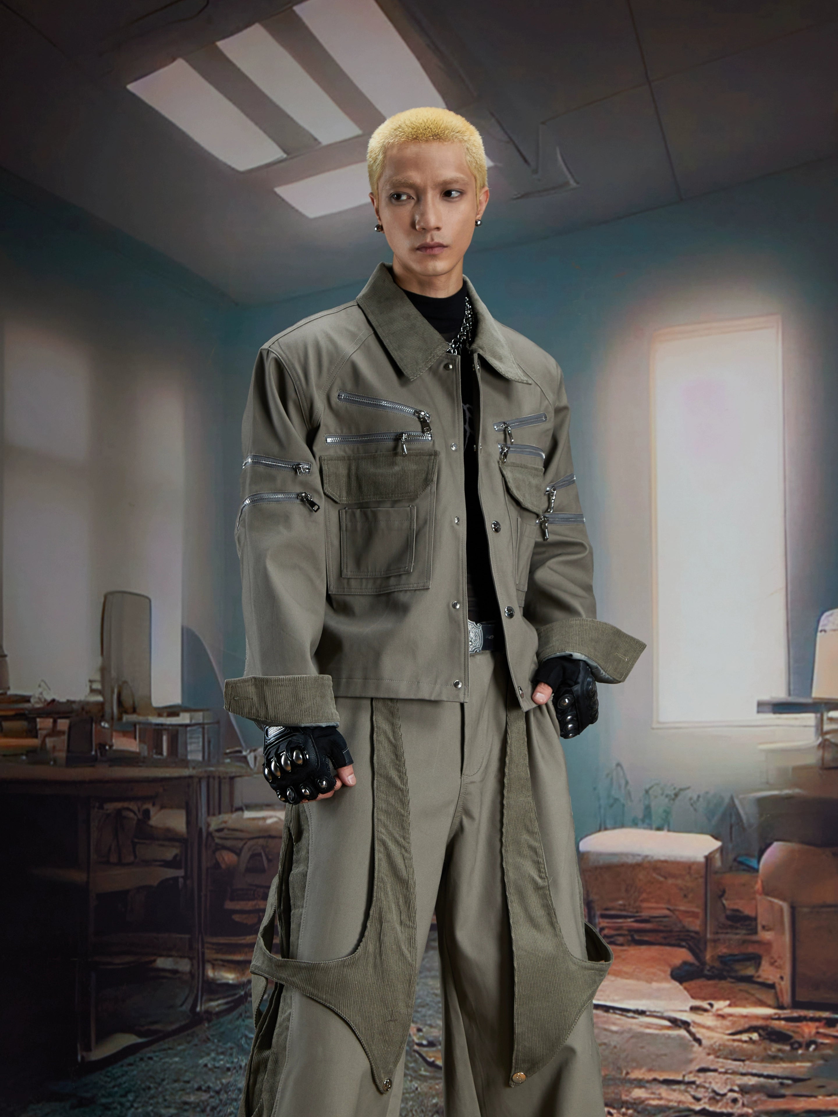 This deconstructed corduroy panel jacket combines zippers, button details, and a short cut for a unique retro look. Its relaxed fit makes it a standout layering piece. Shop original outerwear at Sanhoostudio.