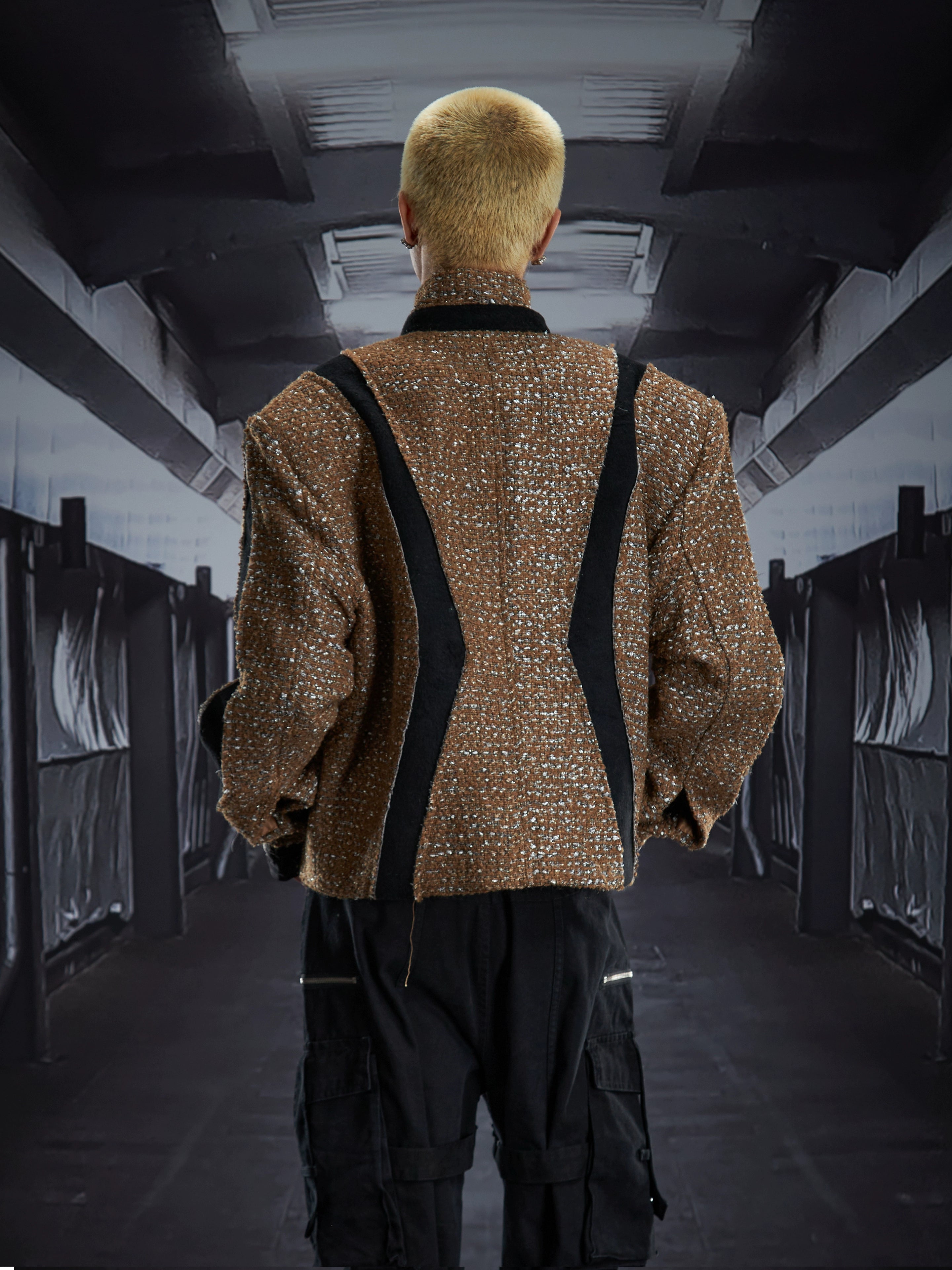 A standout star-cut deconstructed jacket with a structured stand collar and insulated padded body. A winter statement piece designed by Sanhoostudio for elevated street style.