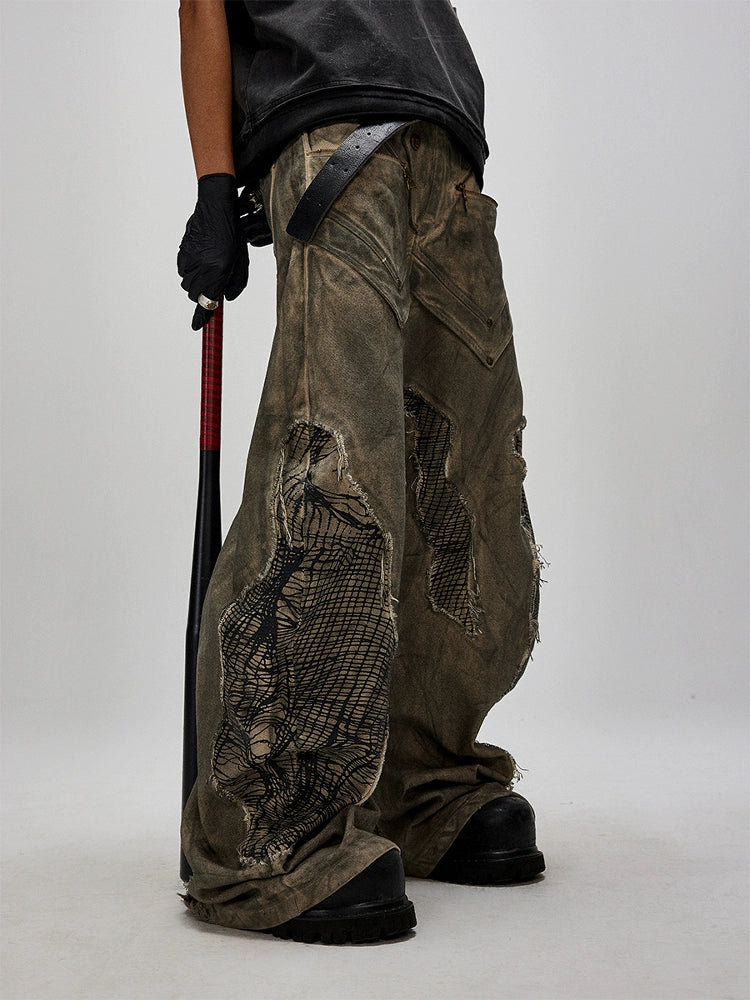 Crafted from 100% cotton, these Irregular Ripped Patchwork Casual Scimitar Canvas Pants feature a relaxed straight-leg fit with edgy ripped and patchwork details. Designed for comfort and style, this streetwear-inspired piece from Sanhoostudio elevates your everyday look with a unique casual vibe.