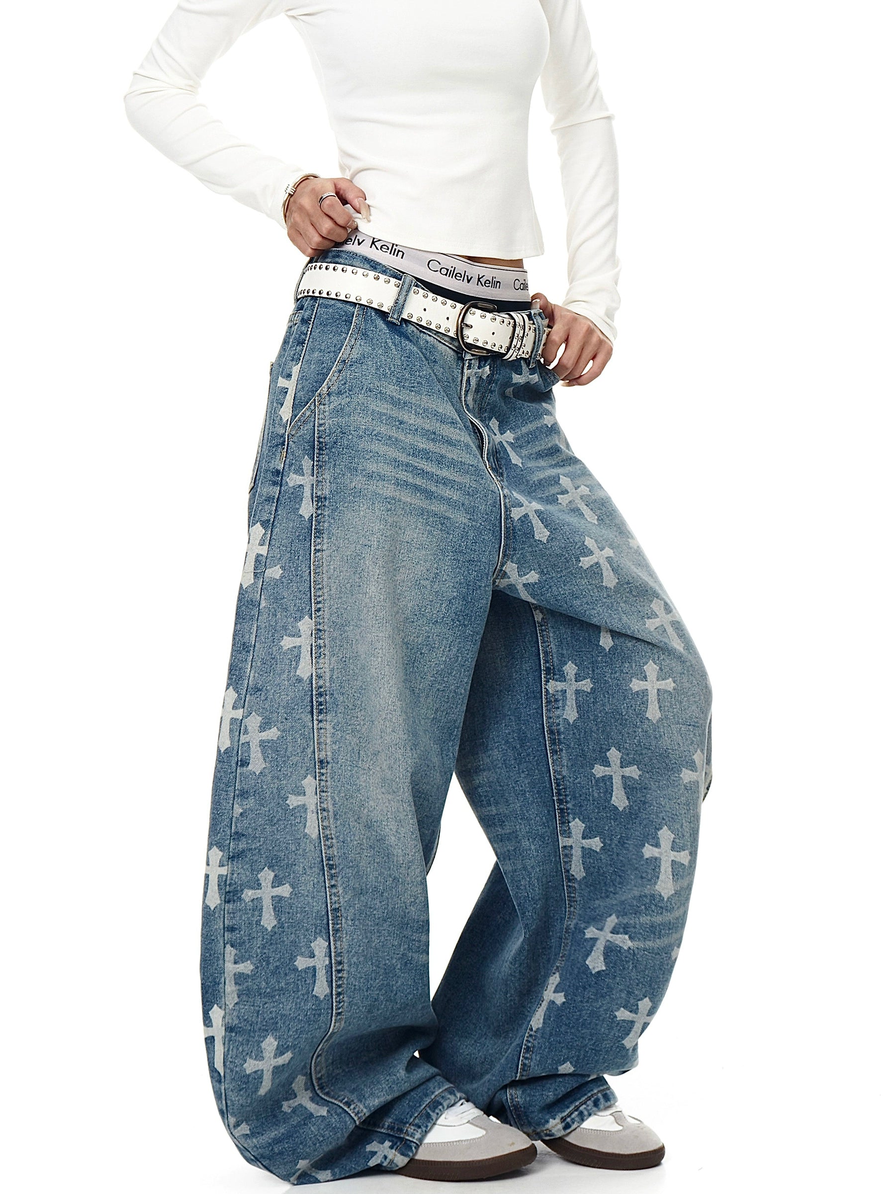 An icon of gothic rebellion — cross-printed denim with a relaxed wide-leg silhouette. Designed for high-street dreamers and underground believers by SanhooStudio.