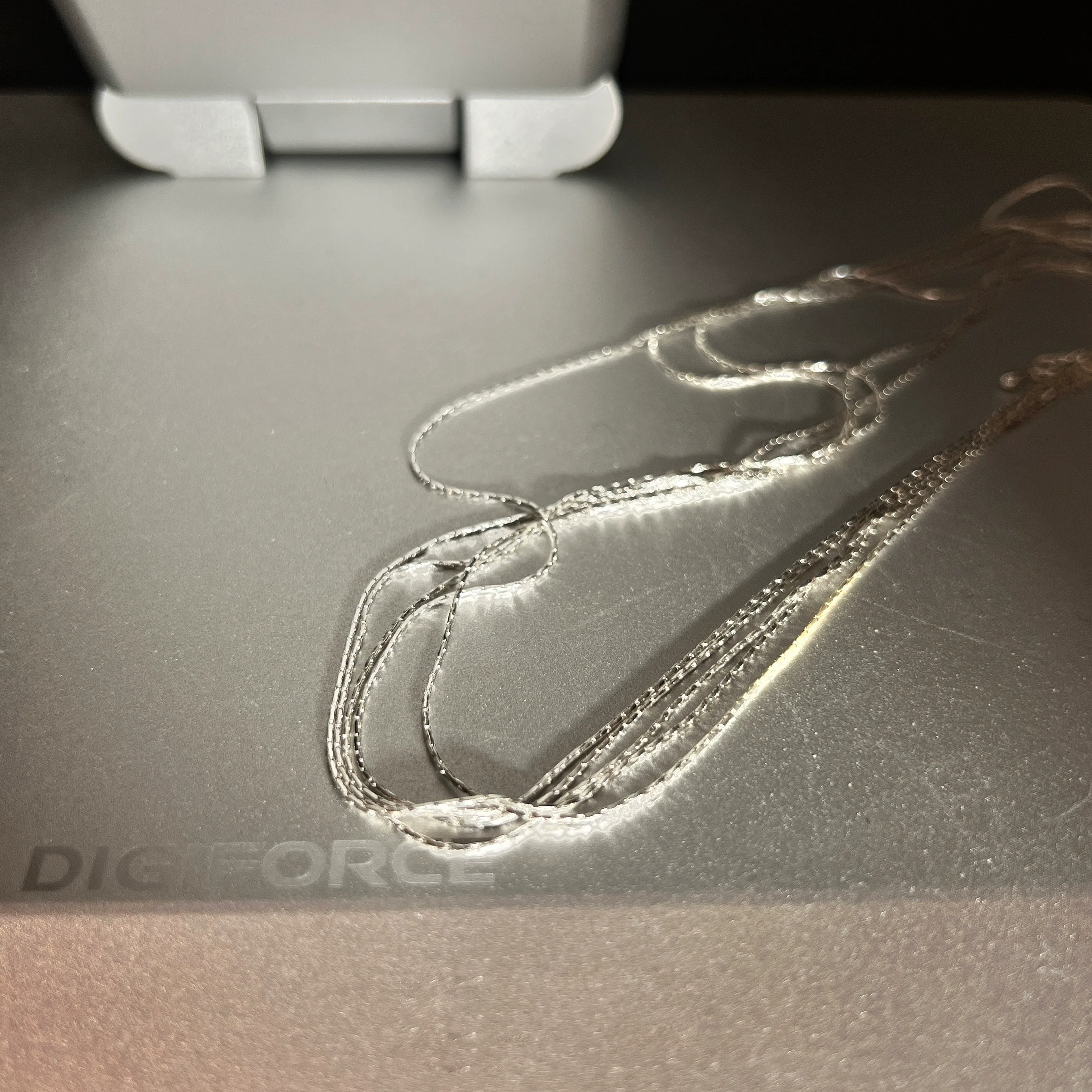 Sanhoostudio’s silver multi-layer thin chain necklace delivers delicate sparkle and romantic bling—perfect for layering, special occasions, and elevating everyday outfits with refined shine.