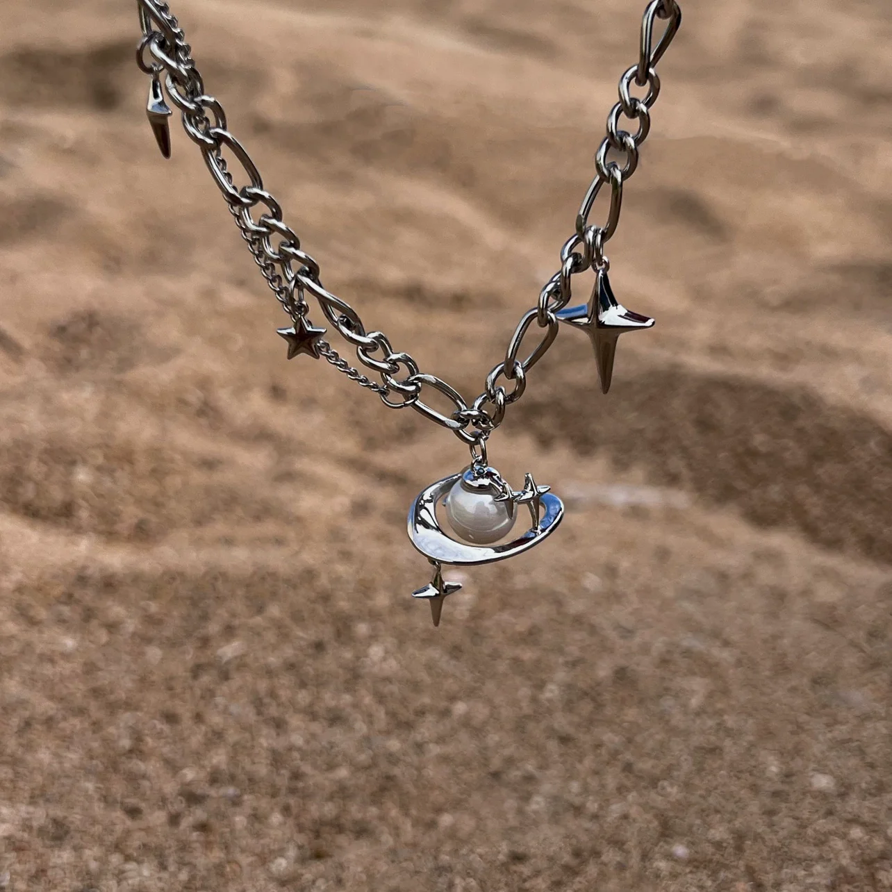 Discover the star geometric pearl layered necklace from Sanhoostudio, designed with chic pearl details and modern double chain style. Perfect for layering with streetwear or luxury outfits. Shop necklaces now at Sanhoostudio.