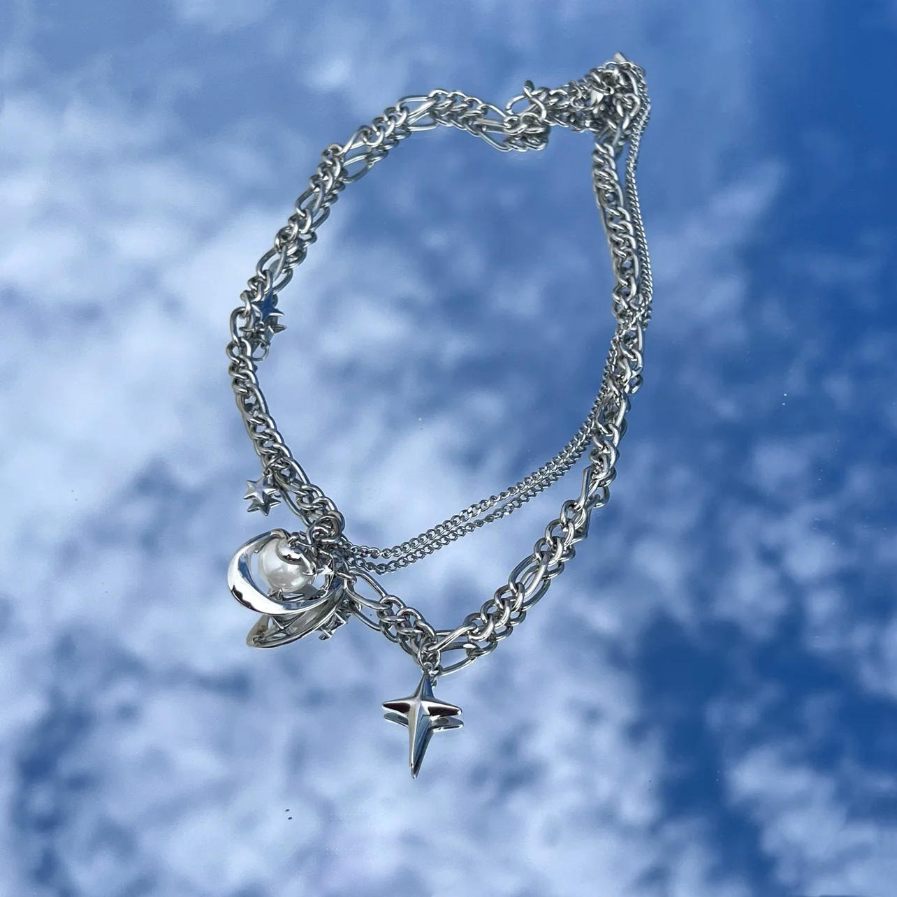 Discover the star geometric pearl layered necklace from Sanhoostudio, designed with chic pearl details and modern double chain style. Perfect for layering with streetwear or luxury outfits. Shop necklaces now at Sanhoostudio.