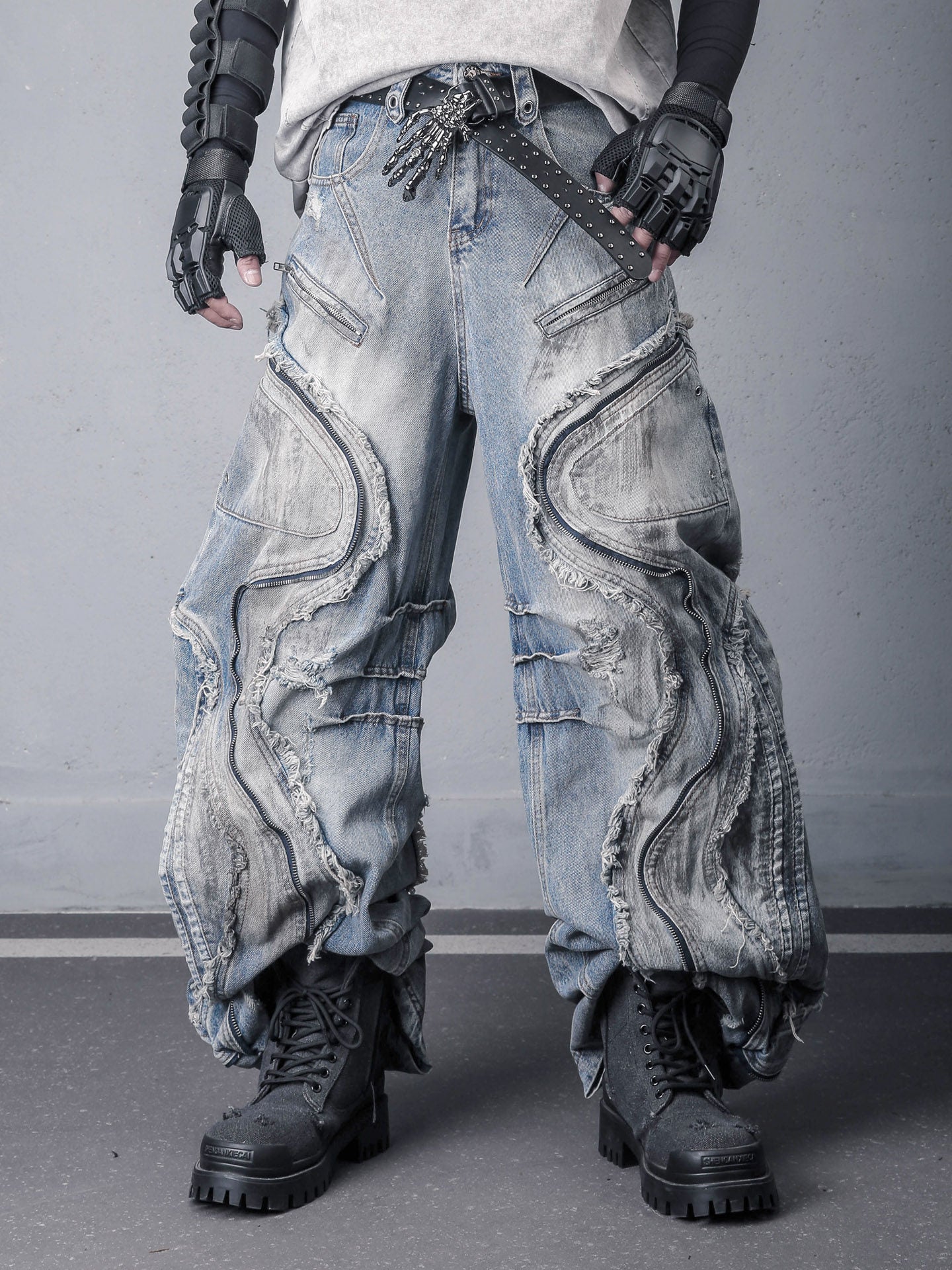 Sanhoostudio denim pants featuring fringe details, deconstructed design, and wide leg silhouette for standout streetwear outfits.