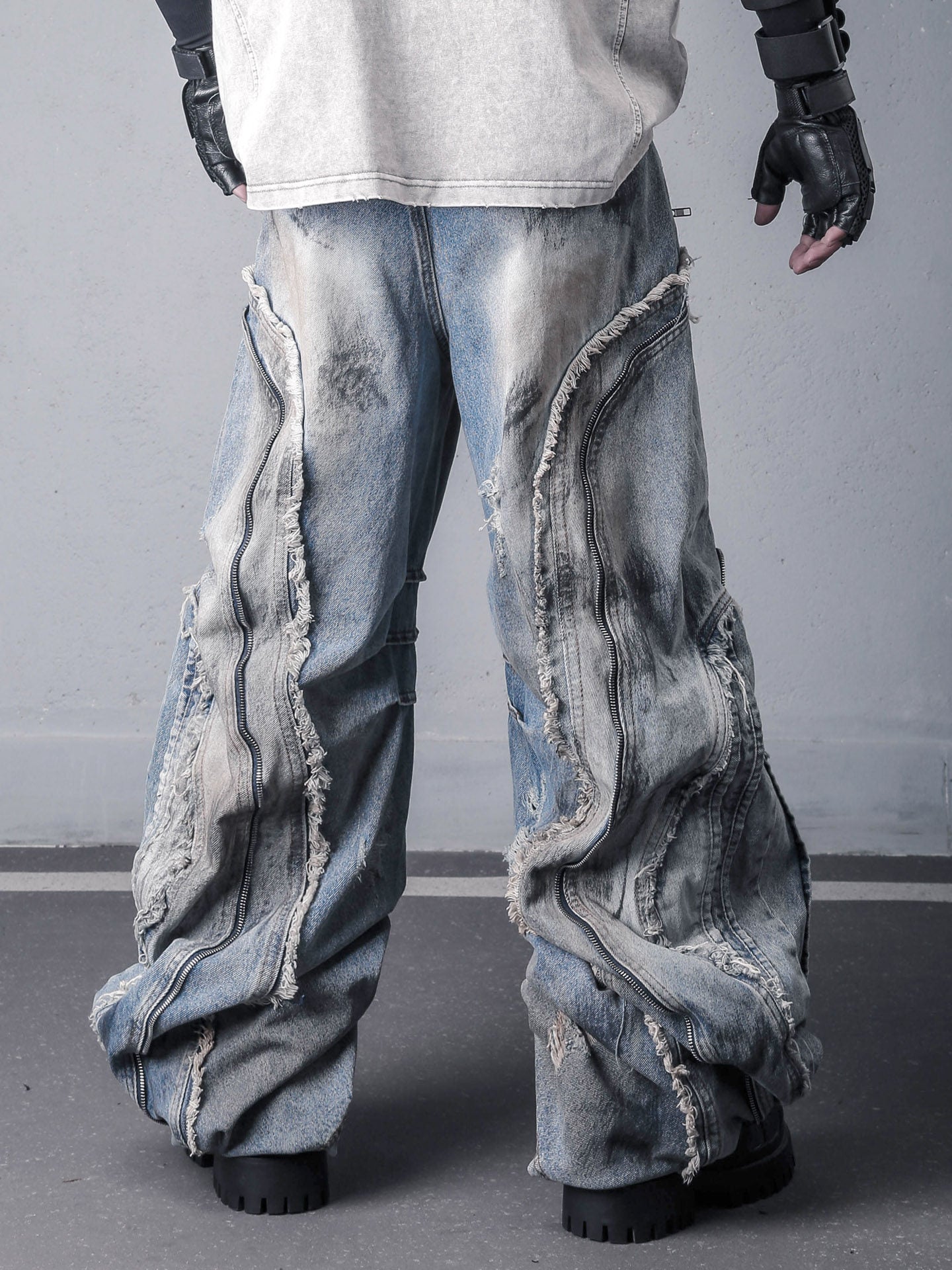 Sanhoostudio denim pants featuring fringe details, deconstructed design, and wide leg silhouette for standout streetwear outfits.