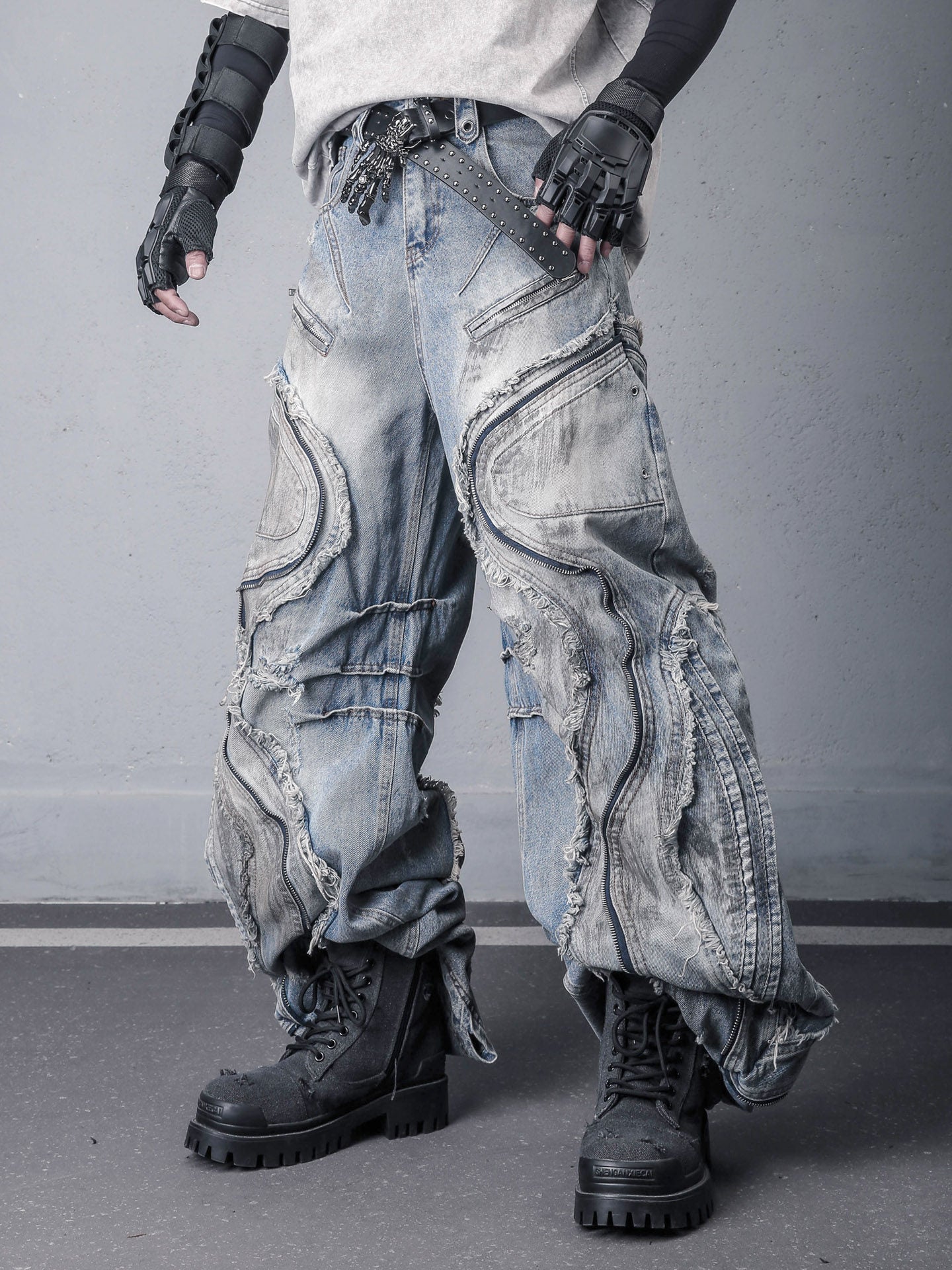 Sanhoostudio denim pants featuring fringe details, deconstructed design, and wide leg silhouette for standout streetwear outfits.