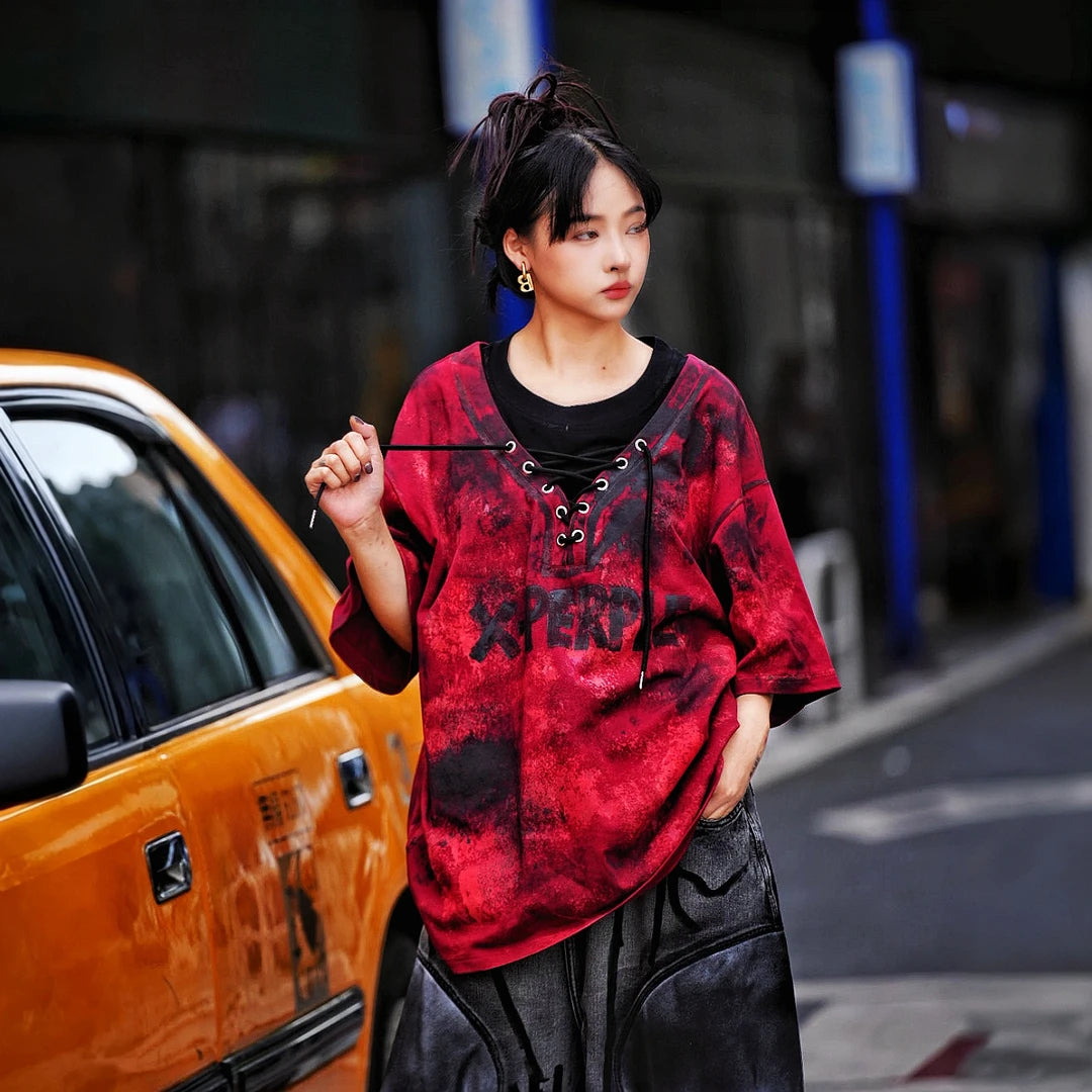 Sanhoostudio short sleeve T-shirt featuring hand painted artwork, patchwork detailing, and oversized fit silhouette. Designed for standout streetwear styling with breathable comfort and relaxed everyday wear.